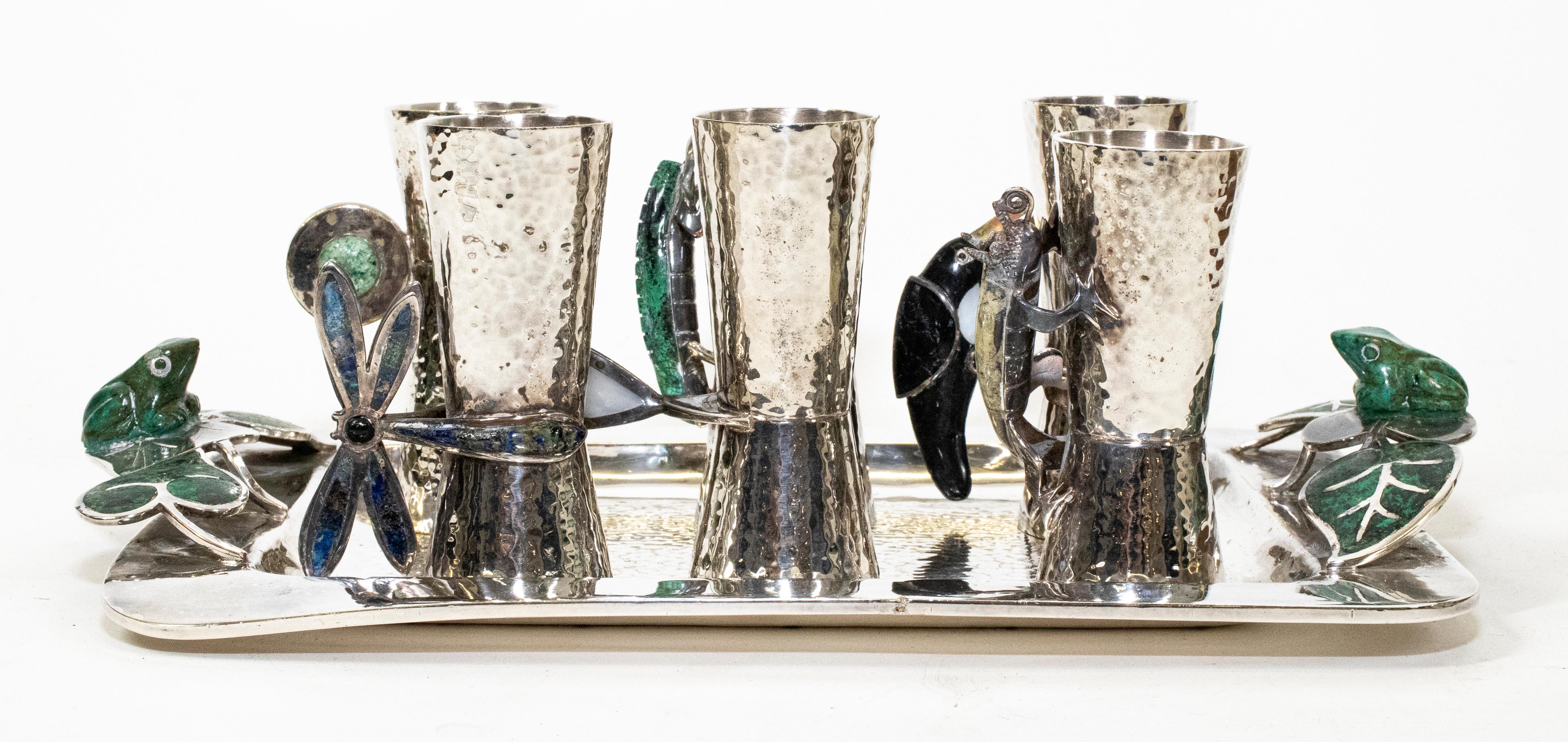 Lost Castillo Mexican silver plate hand pounded tray with 6 matching silver plate shot glasses. Tray has semiprecious malachite frogs sitting on lily pads. Each silver plate shot glass has a handle with semi-precious stones with insects,