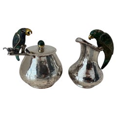 Crémier et sucrier en argent de Los Castillo avec perroquets