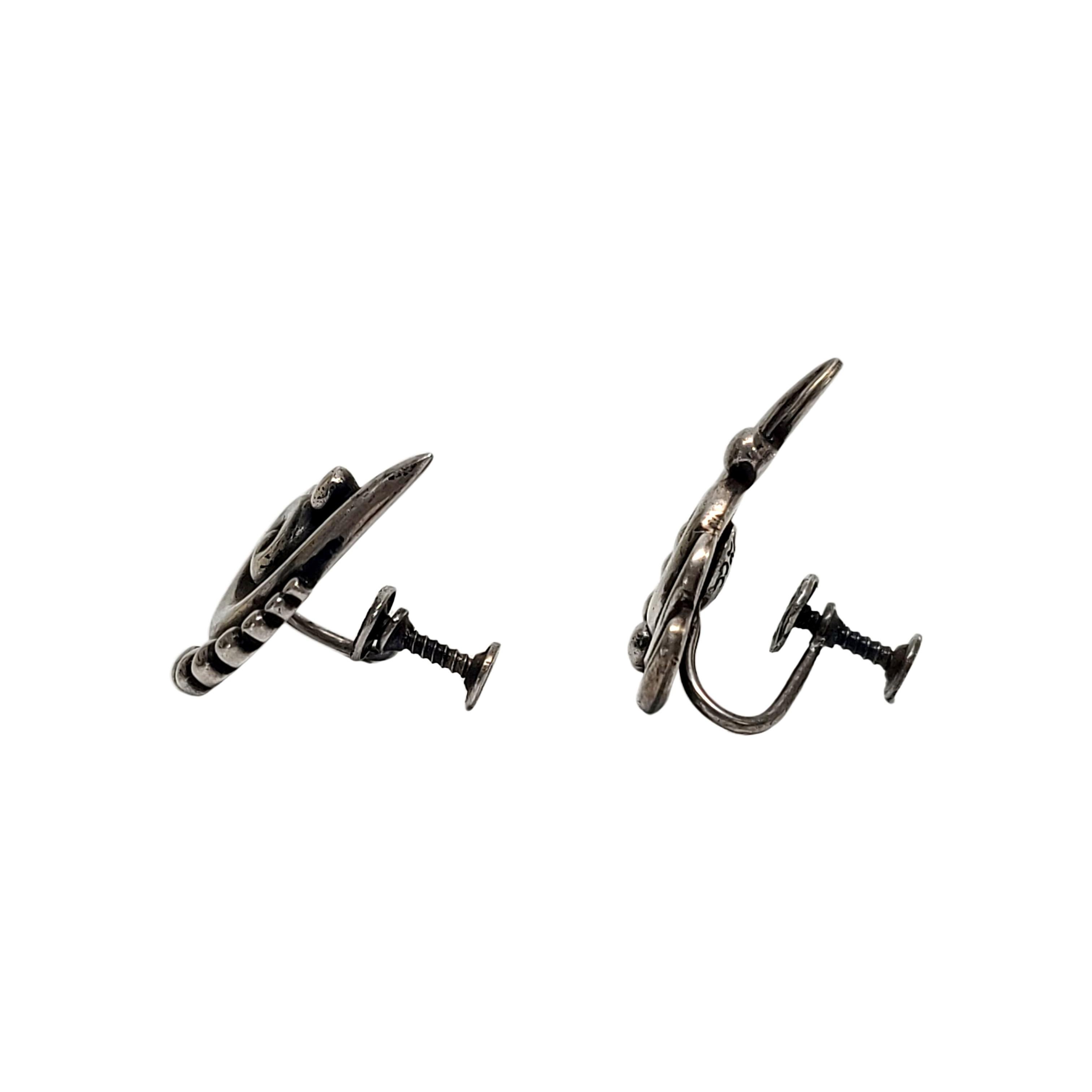 Los Castillo of Taxco, Mexico sterling silver screw back earrings, design #508.

Los Castillo is a renowned and influential Taxco workshop producing pieces of high quality design and craftsmanship. Los Castillo pieces are highly collectible today.