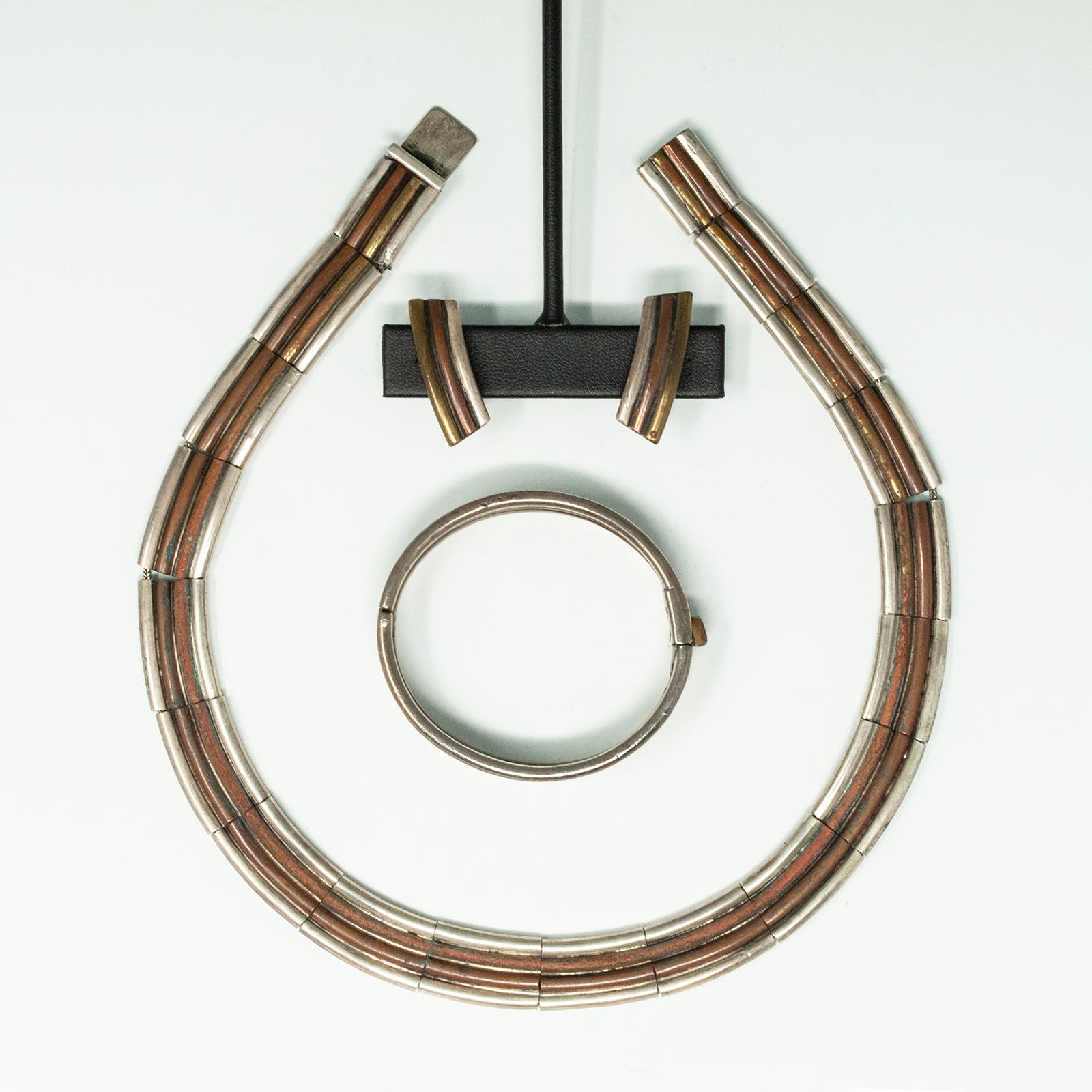 Matching Los Castillo silver necklace, bracelet and earring set. Made in Mexico with Los Castillos and Taxco markings, design #144. Featuring copper, brass and sterling silver. Sleek and modern design. Necklace and bracelet both have an open box