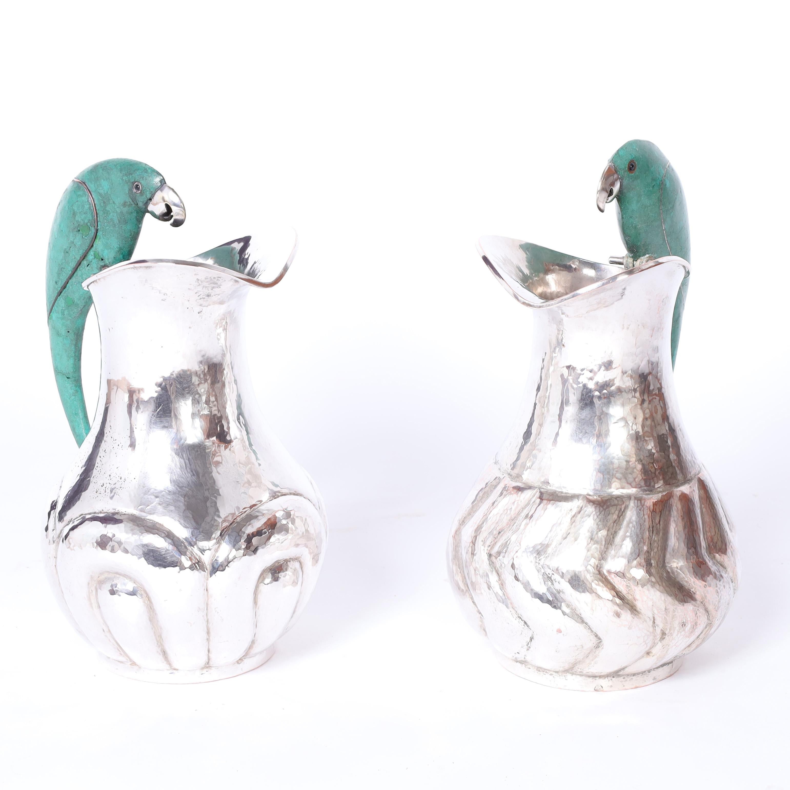 Mid-Century Modern Los Castillo Style Near Pair of Mid Century Silver Plate Pitchers with Parrots For Sale