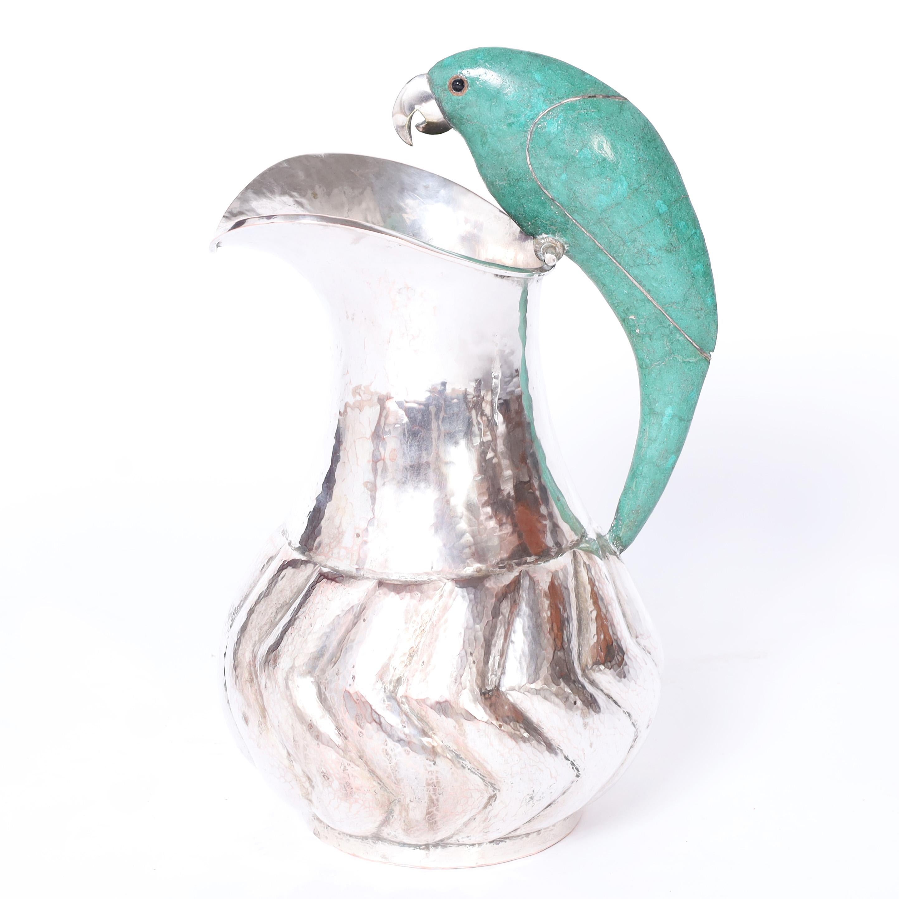 Los Castillo Style Near Pair of Mid Century Silver Plate Pitchers with Parrots In Good Condition For Sale In Palm Beach, FL