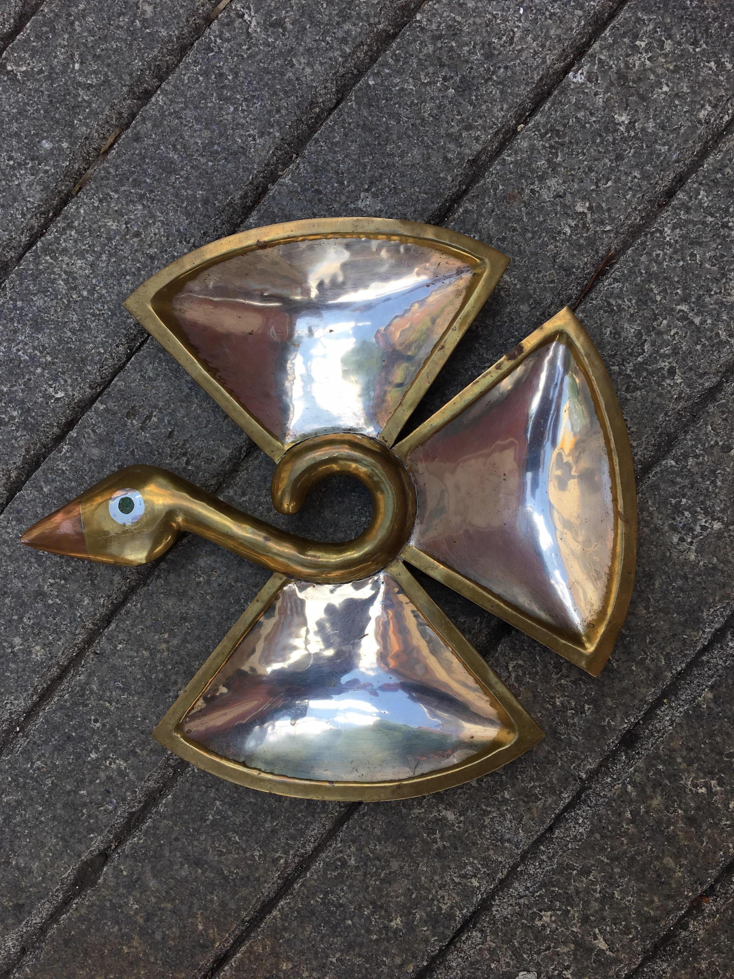Multi metals Los Castillo bird with a polished stone eye. Signed on back of head.