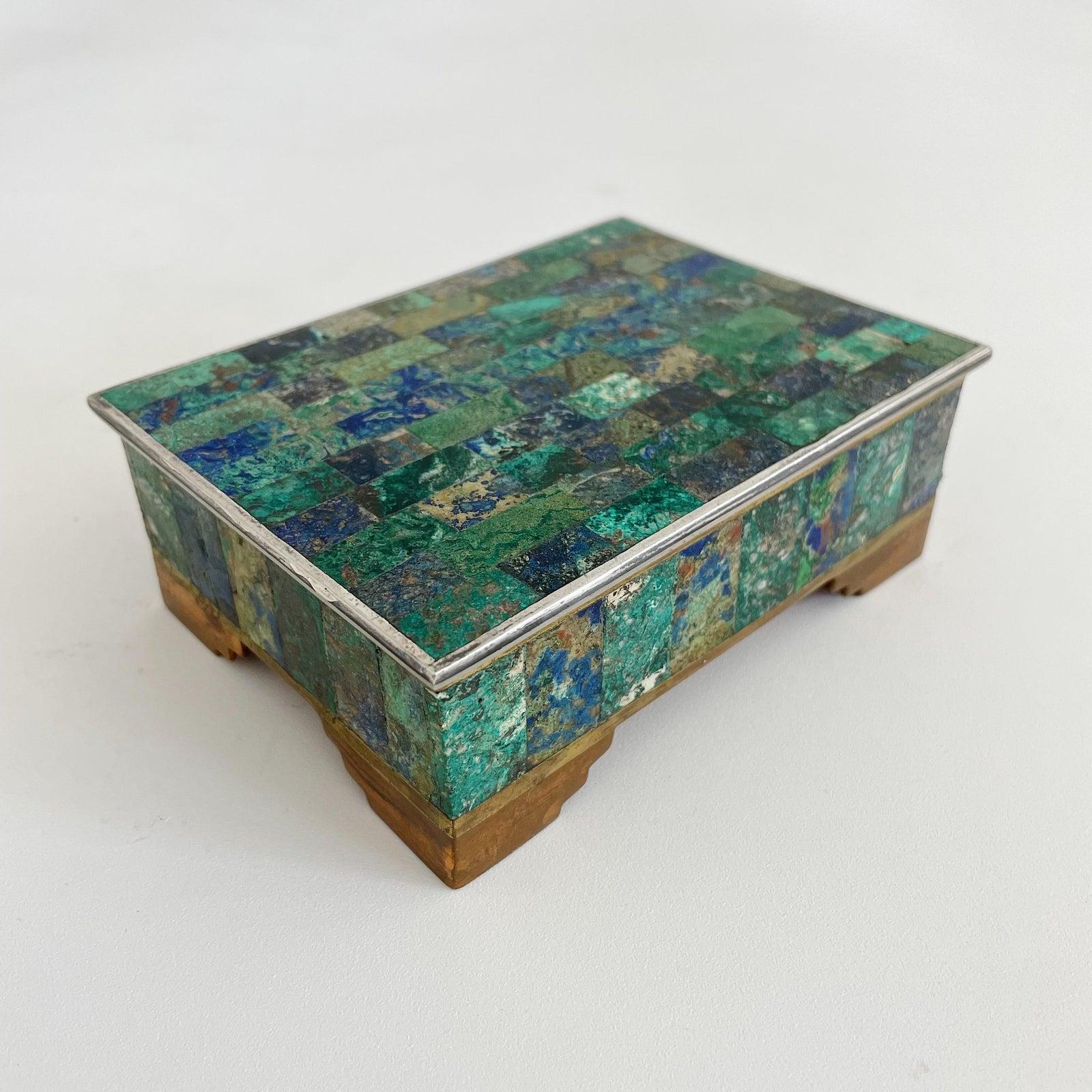 Brass, copper, and silver-plate ornate hinged jewelry box with malachite & lapis lazuli inlay. Made by Los Castillos in Taxco Mexico
Stamped on underside : 210 LOS CASTILLO, TAXCO, HECHO EN MEXICO.