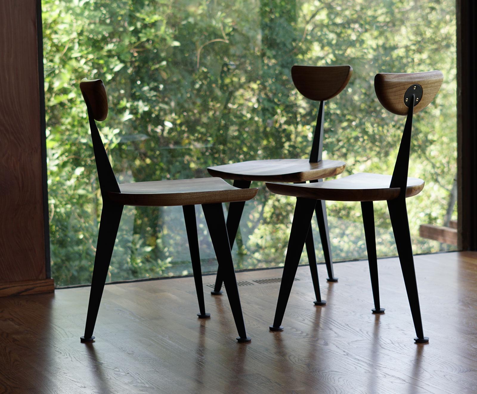 The Los Gatos dining chair was inspired by a favorite client who didn't want his dining set to block too much of his gorgeous view. Taking cues from mid-century masters like Jean Prouve, we designed a chair with a minimum of structure: two steel