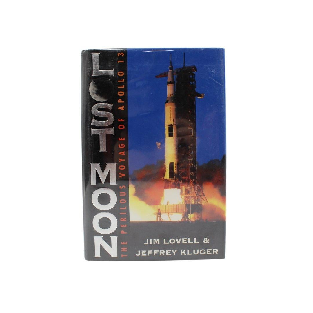 Luna perdida: El peligroso viaje del Apolo 13 por Lovell y Kluger, firmado por Lovell Moderno