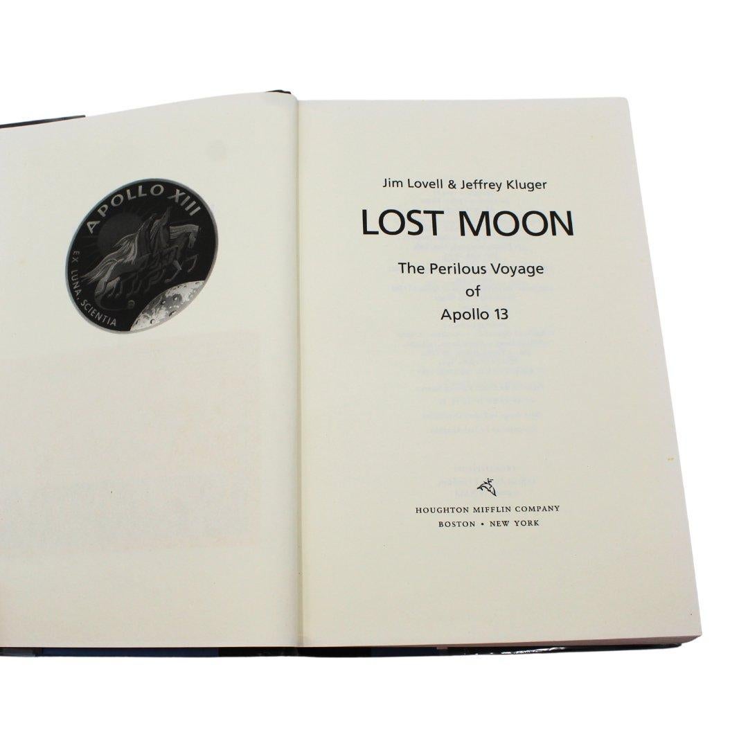 Luna perdida: El peligroso viaje del Apolo 13 por Lovell y Kluger, firmado por Lovell finales del siglo XX