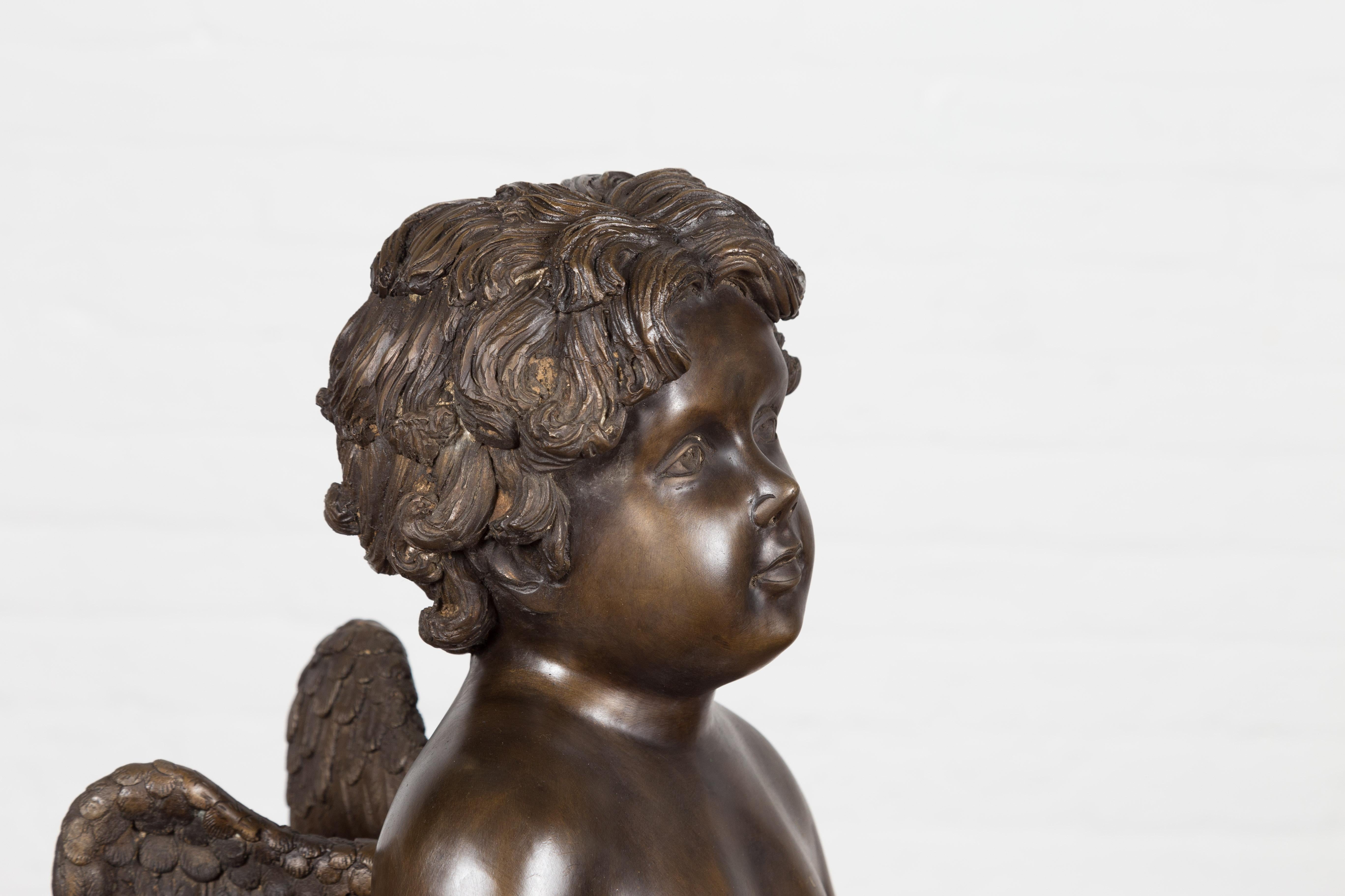 Lost Wax Bronze Statue of a Winged Cherub Standing on a Shell in Dark Patina For Sale 4