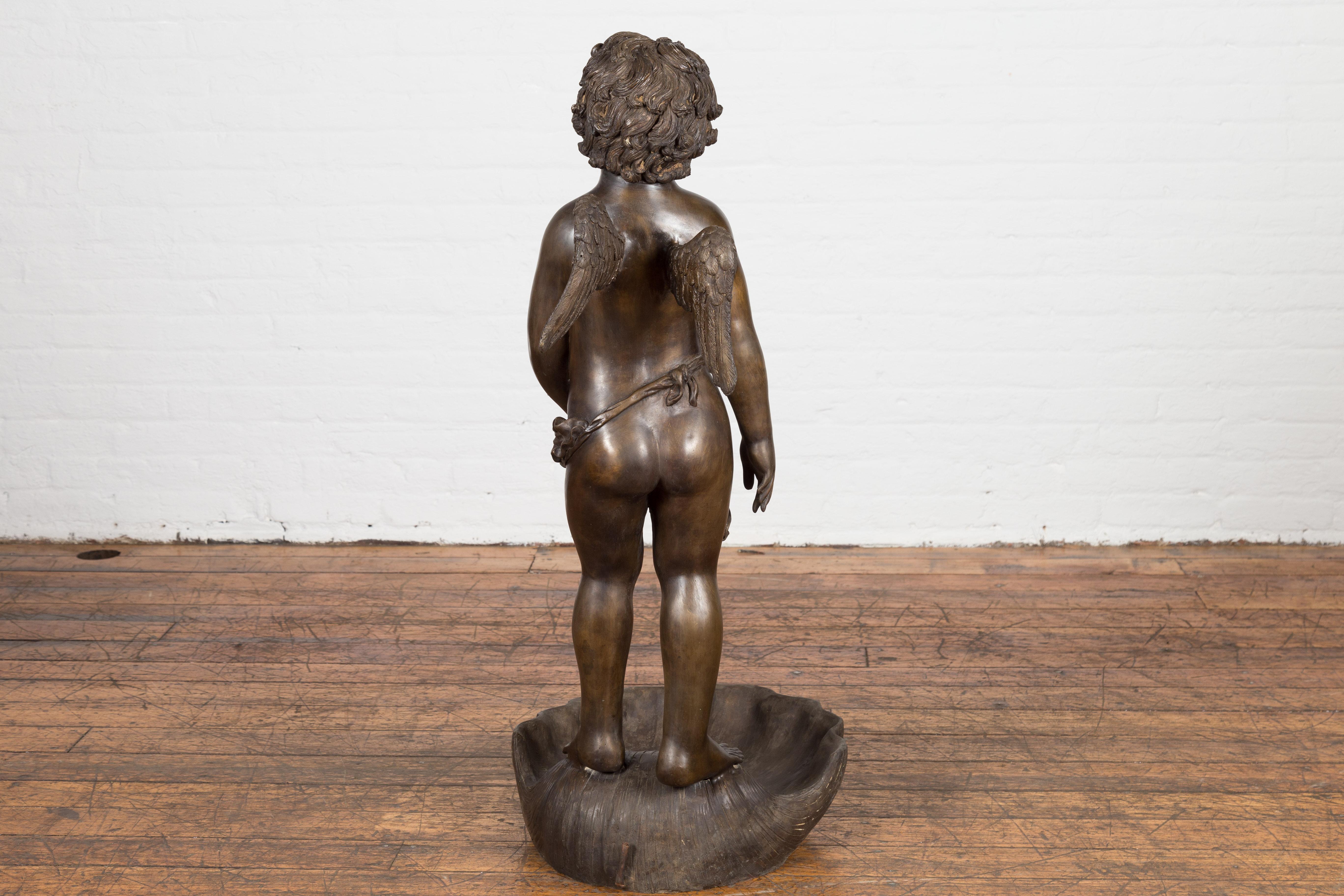 Lost Wax Bronze Statue of a Winged Cherub Standing on a Shell in Dark Patina For Sale 8