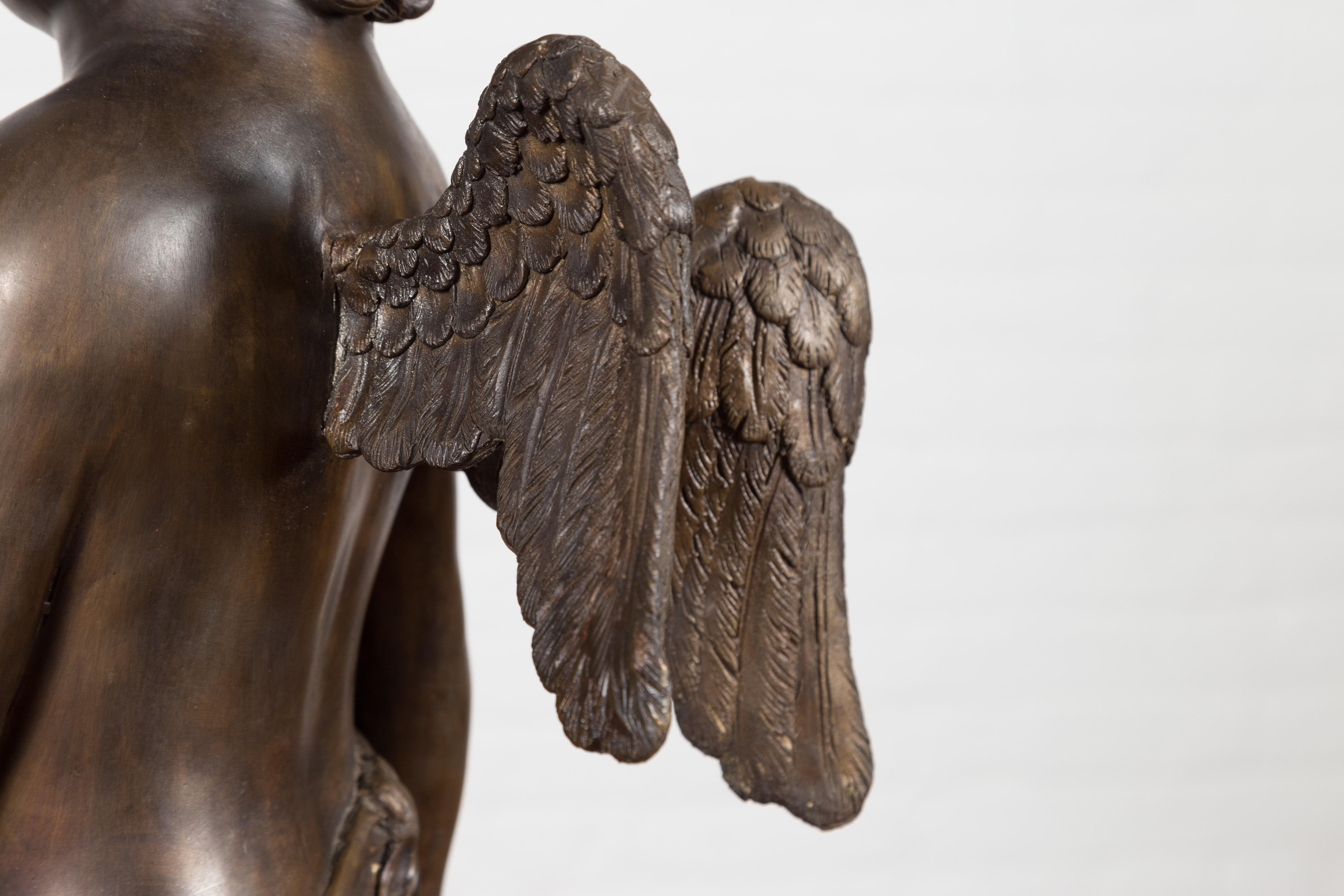 Lost Wax Bronze Statue of a Winged Cherub Standing on a Shell in Dark Patina For Sale 11