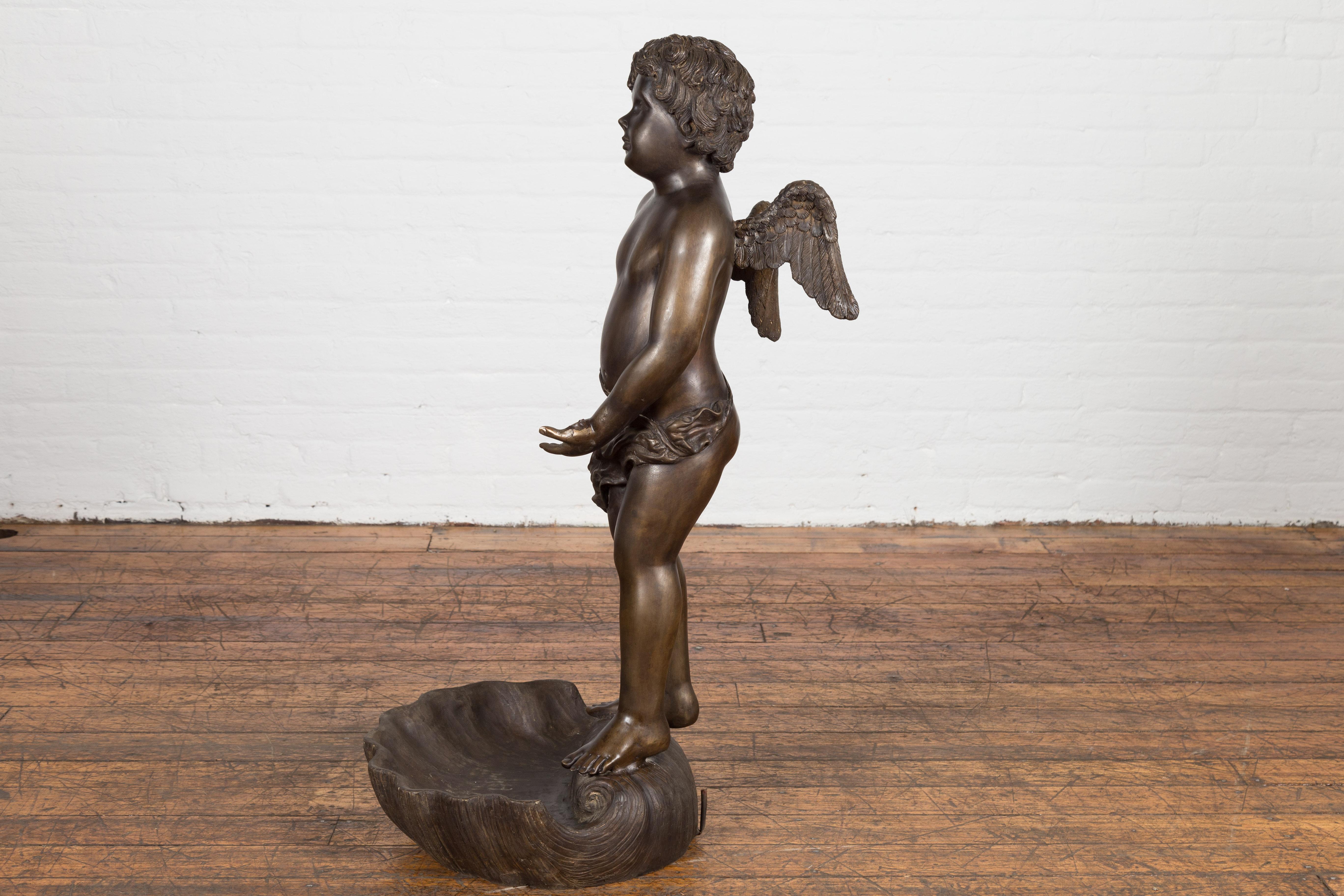 Lost Wax Bronze Statue of a Winged Cherub Standing on a Shell in Dark Patina For Sale 13