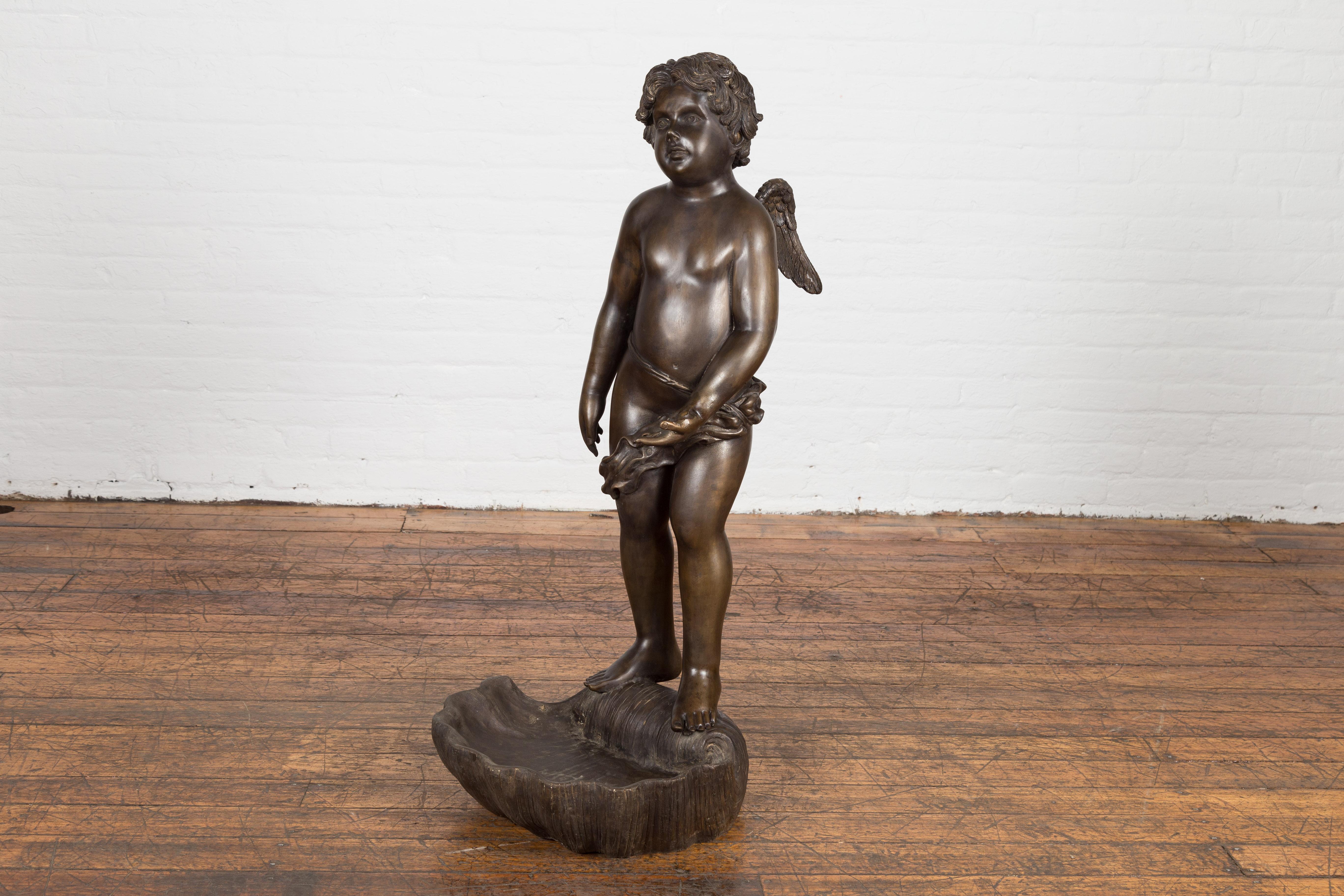 Lost Wax Bronze Statue of a Winged Cherub Standing on a Shell in Dark Patina For Sale 14