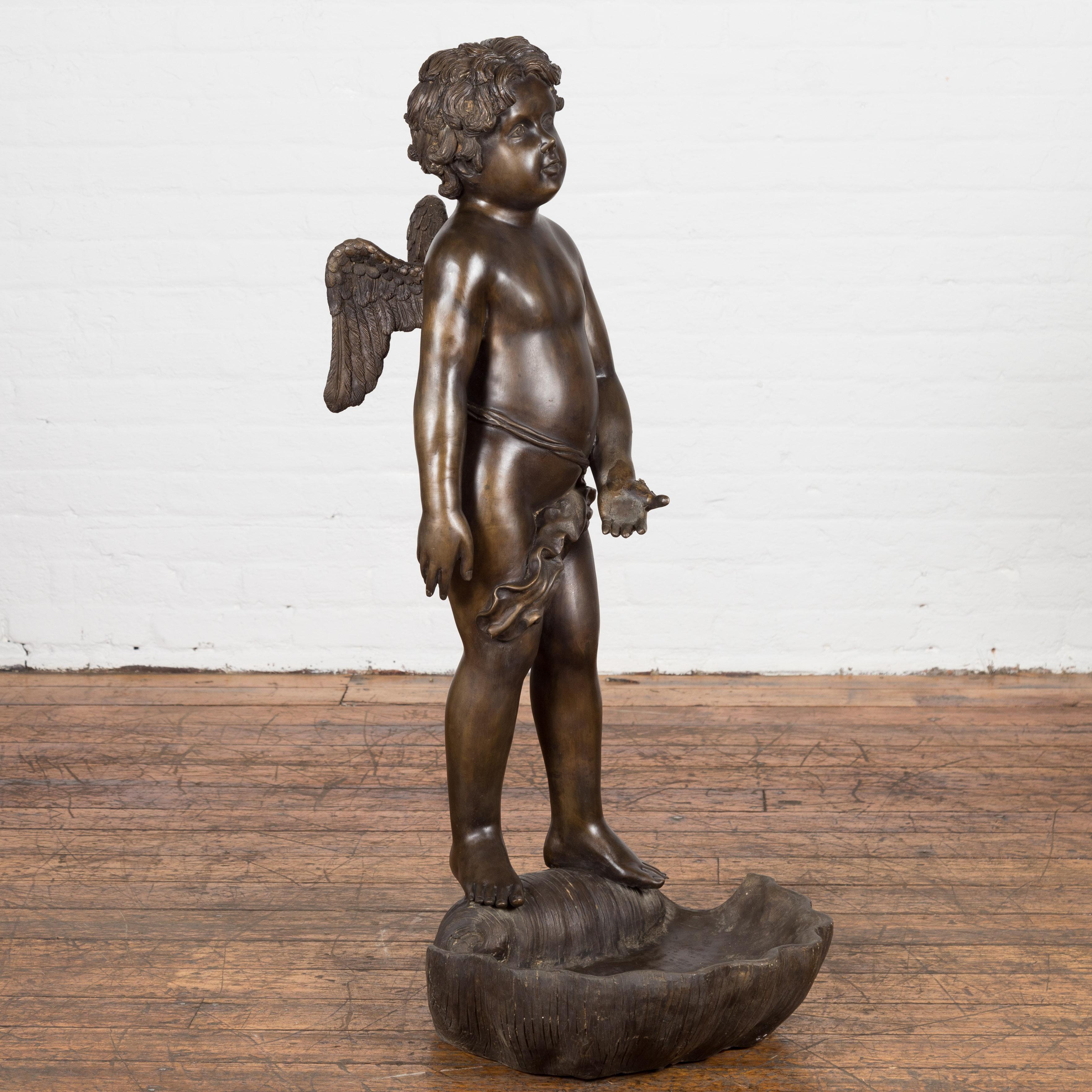 Lost Wax Bronze Statue of a Winged Cherub Standing on a Shell in Dark Patina For Sale 2