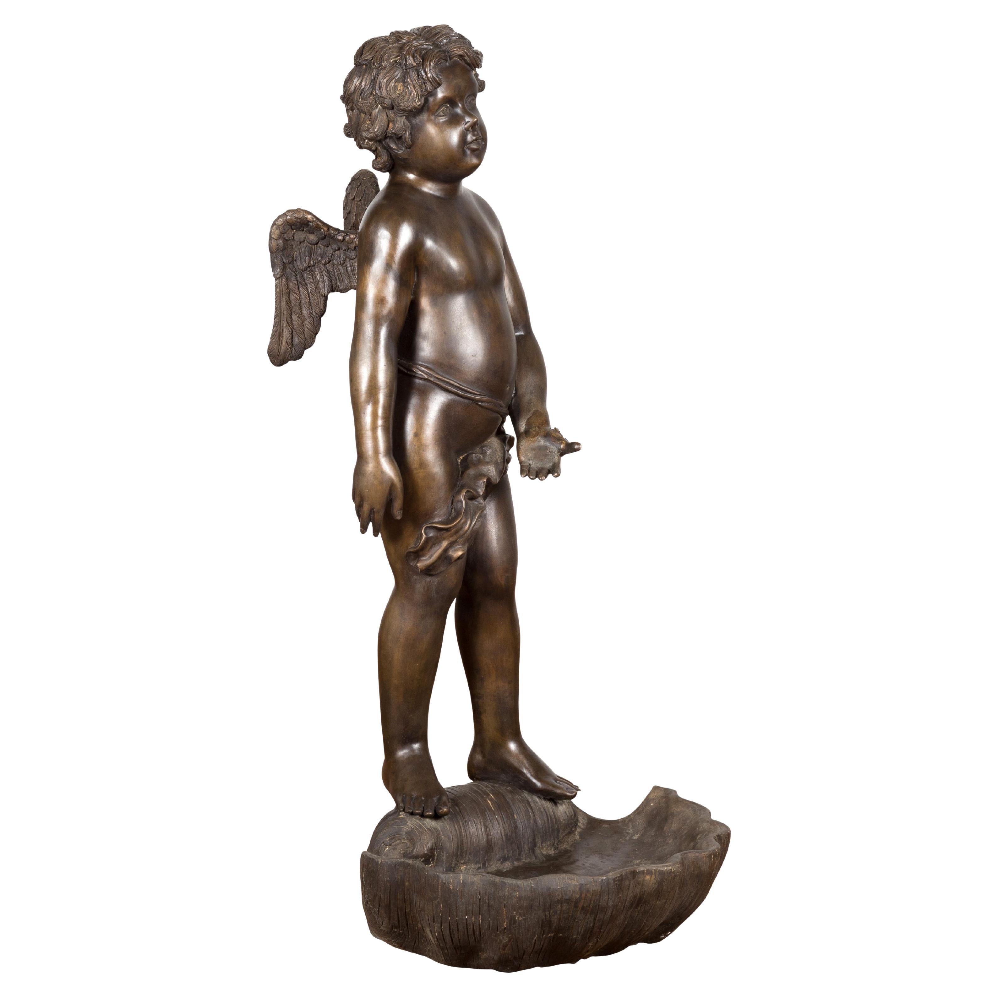 Lost Wax Bronze Statue of a Winged Cherub Standing on a Shell in Dark Patina