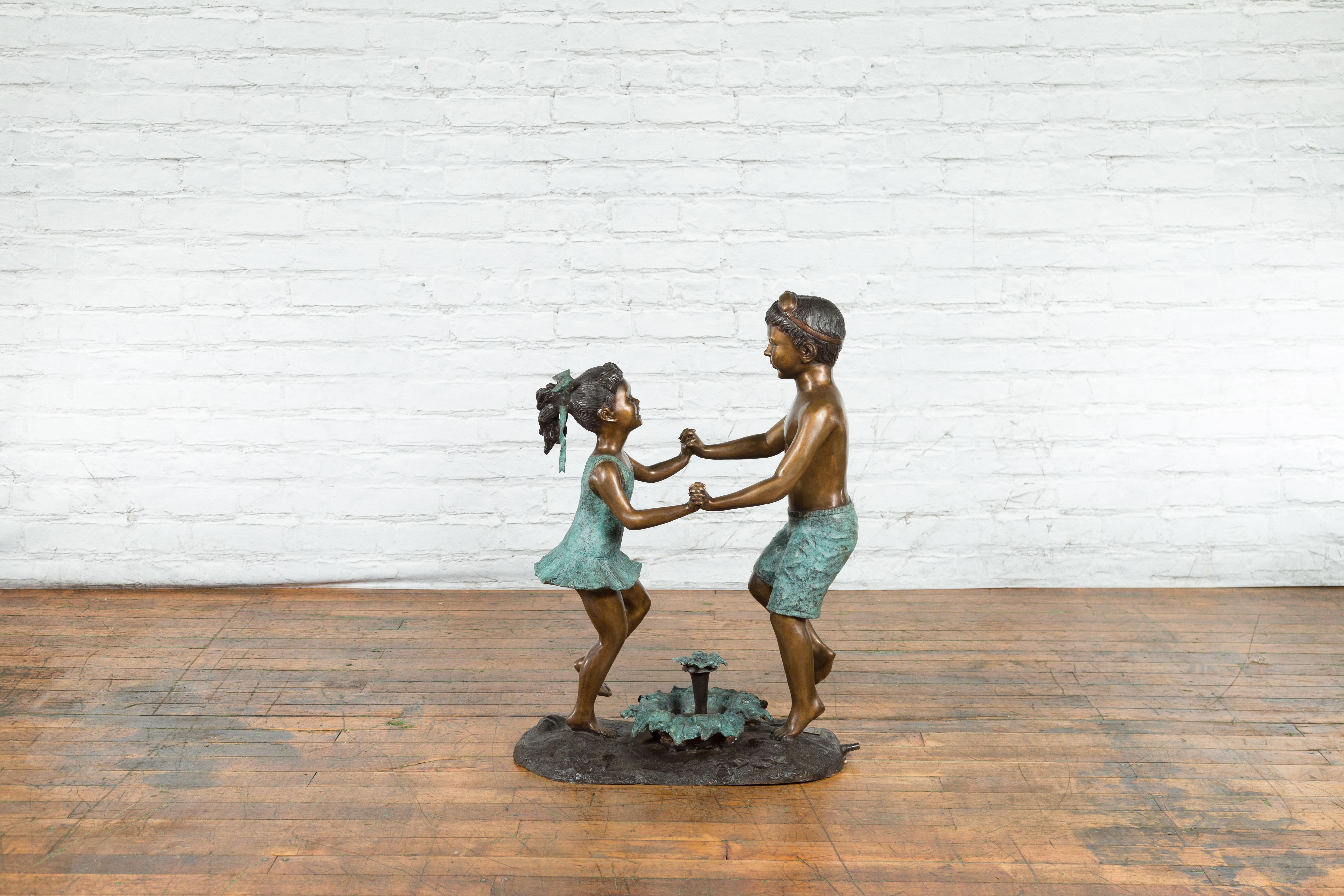 Contemporary Lost Wax Cast Bronze Sculpted Group of Dancing Siblings, Tubed as a Fountain