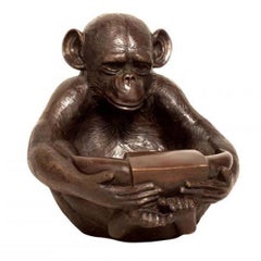 Lost Wax Cast Bronze Sculpture of a Sitting Monkey Holding a Bowl