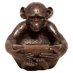 Lost Wax Cast Bronze Sculpture of a Sitting Monkey Holding a Bowl