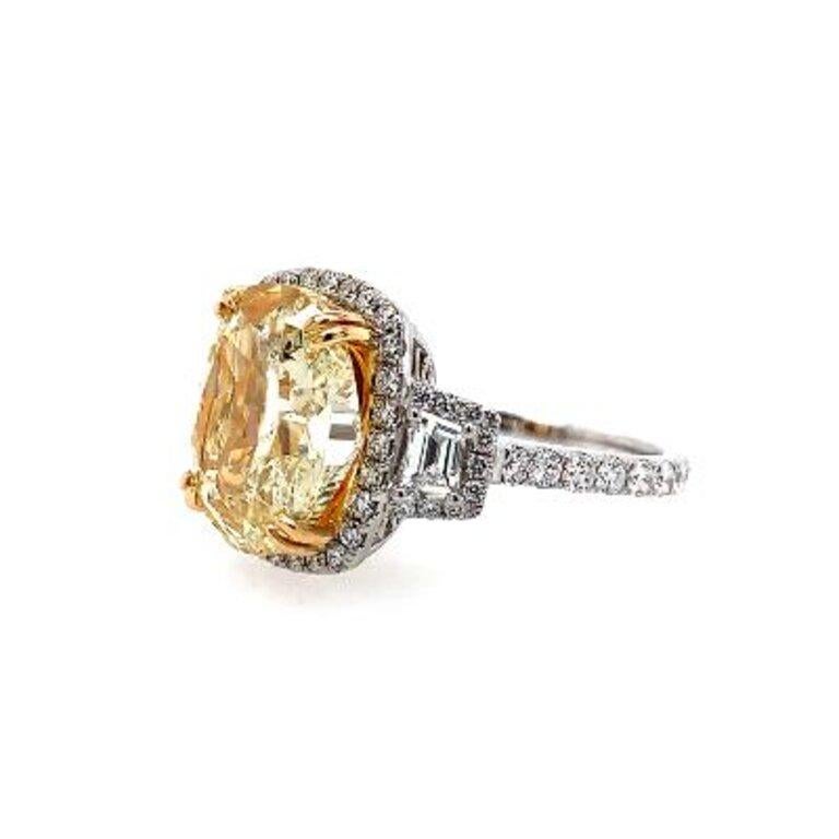 Gia Certified Oval 6.01 cts Fancy Light Yellow  vs2 set in 18k Halo Ring (1.15 cts Sidestones)
Ring option: You can choose your own Ring size (must be set before shipping item only).
Return Policy: 3 days from delivery
Buyer pays for all return