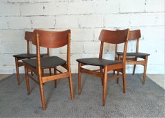 Lot de 4 chaises vintage en bois et simili cuir