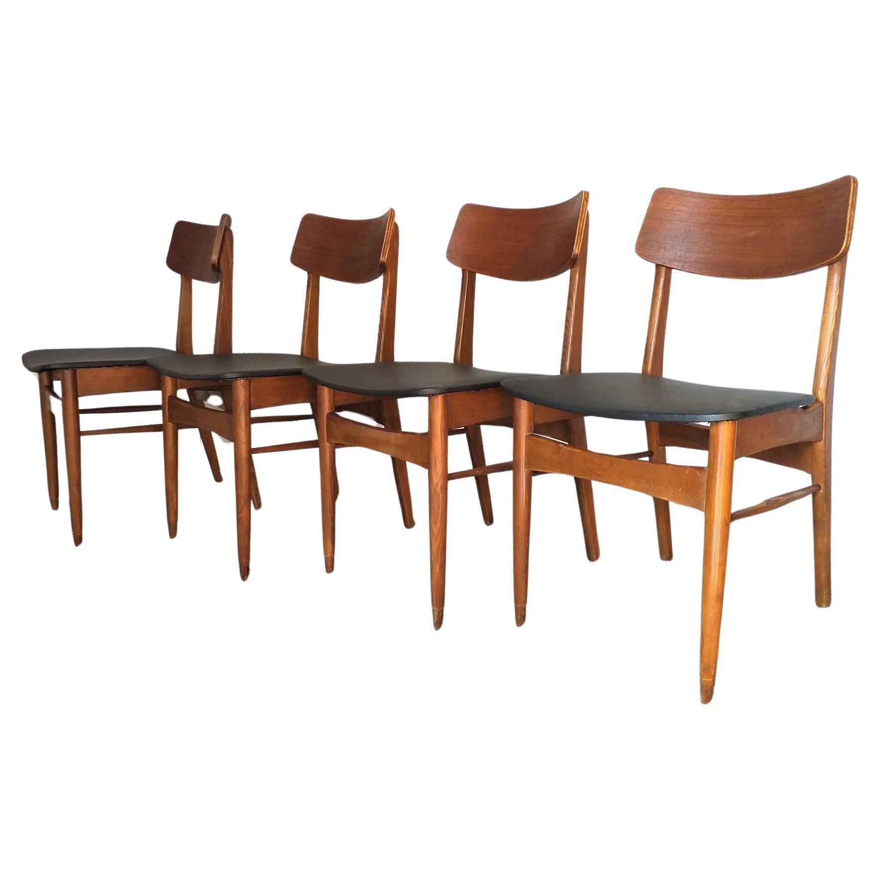 Lot de 4 chaises vintage en bois et simili cuir en vente
