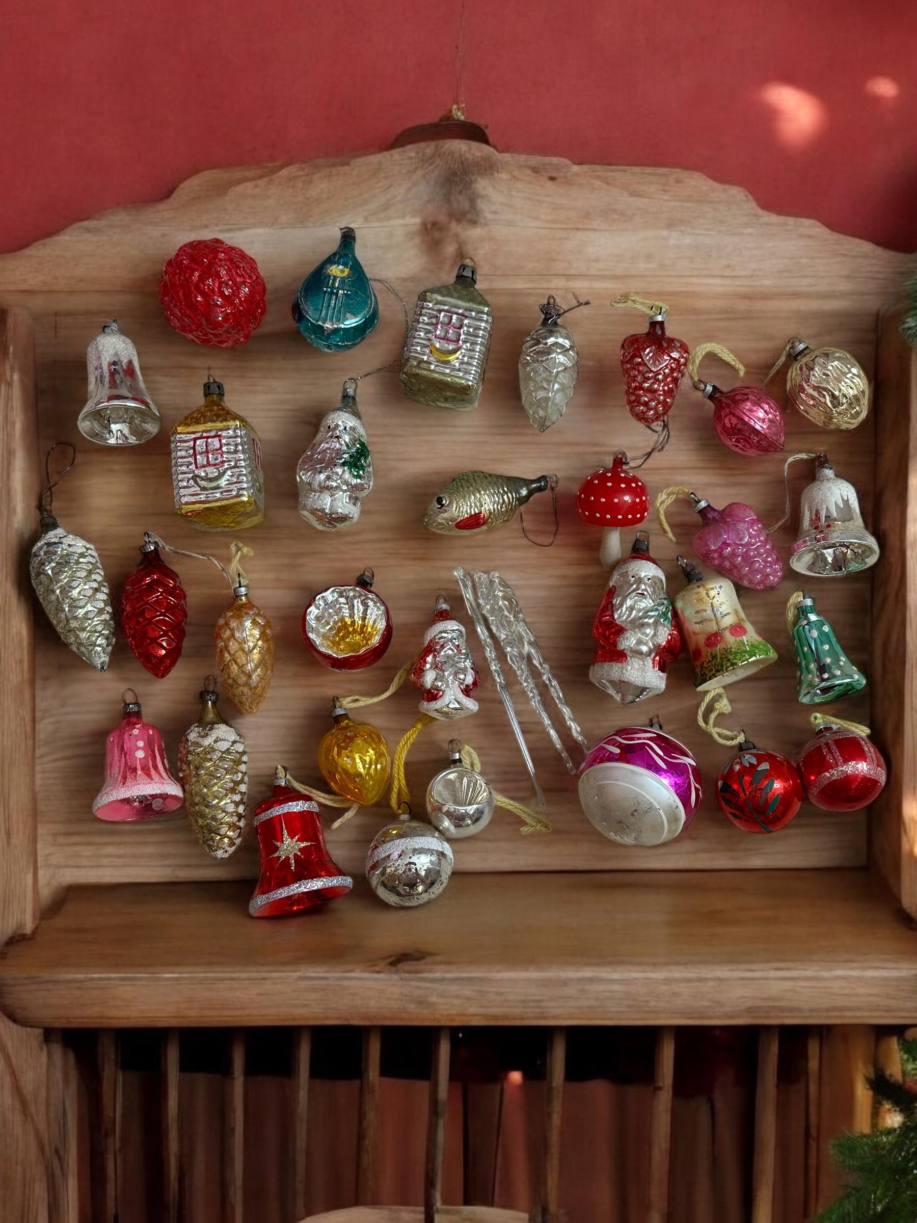 A rare vintage and antique ornament collection. The size given in the dimensions section refers to the larger Santa Claus in red Coat seen in the first picture. These ornaments, were made from ultra-thin hand blown mercury glass, would be a great
