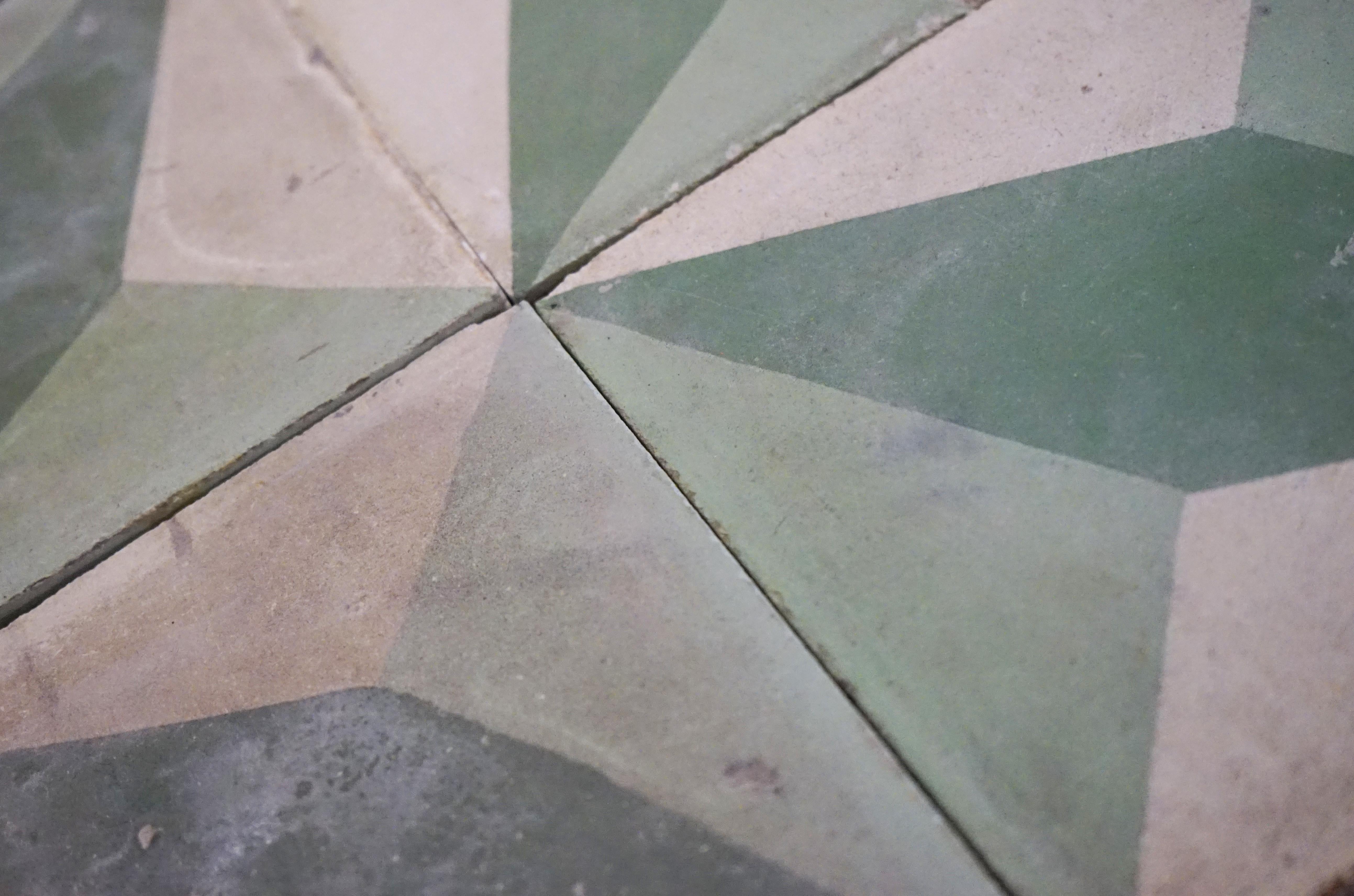This lot of green, white, and grey tiles are reclaimed from Northern France circa 1900s. Each individual tile measures 8 inches x 8 inches and 1 inch thick.

600 square feet available and sold in this lot.