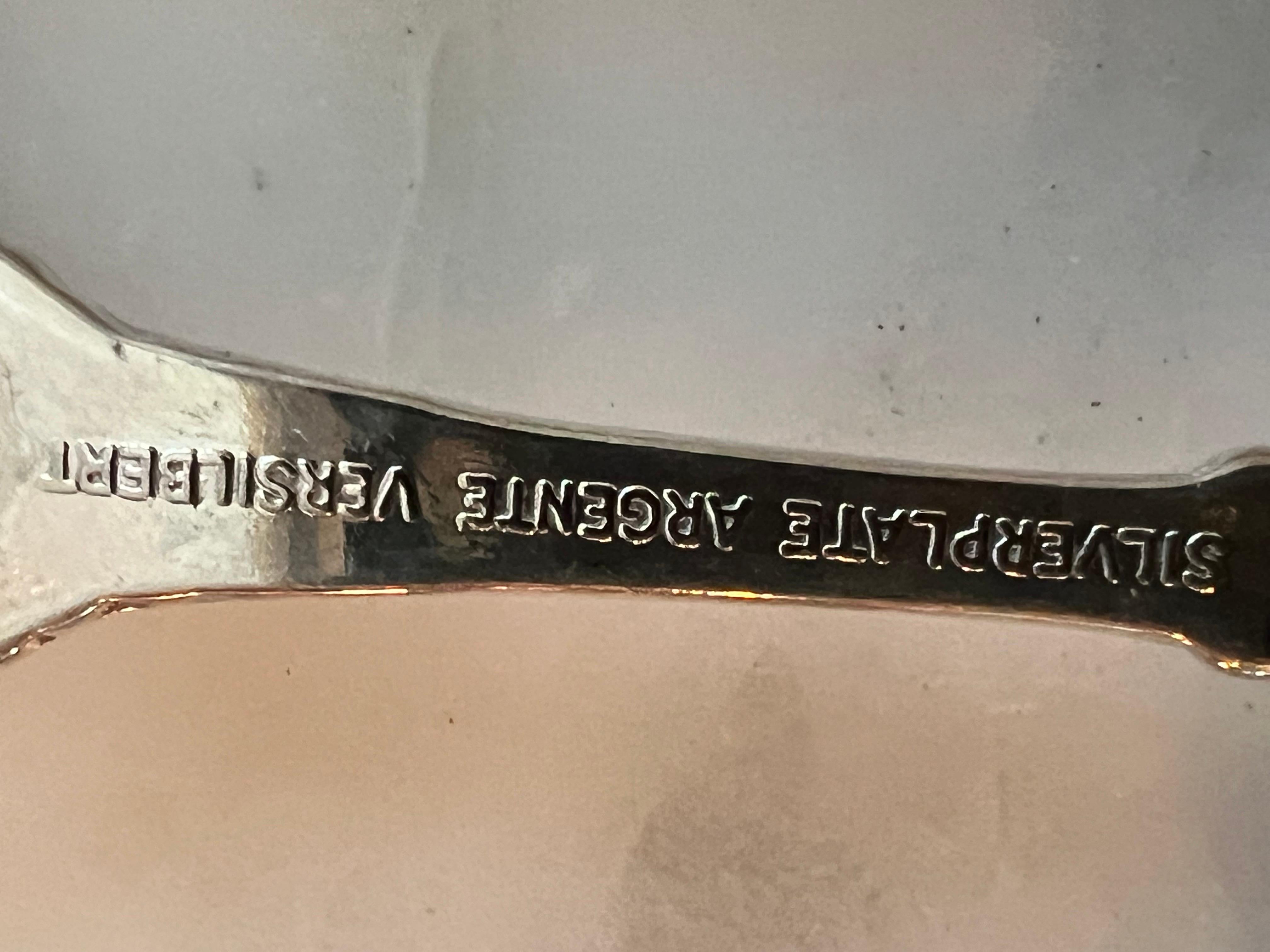 Placcato argento lotto di 7 Cucchiai da collezione in argento placcato d'Europa in vendita