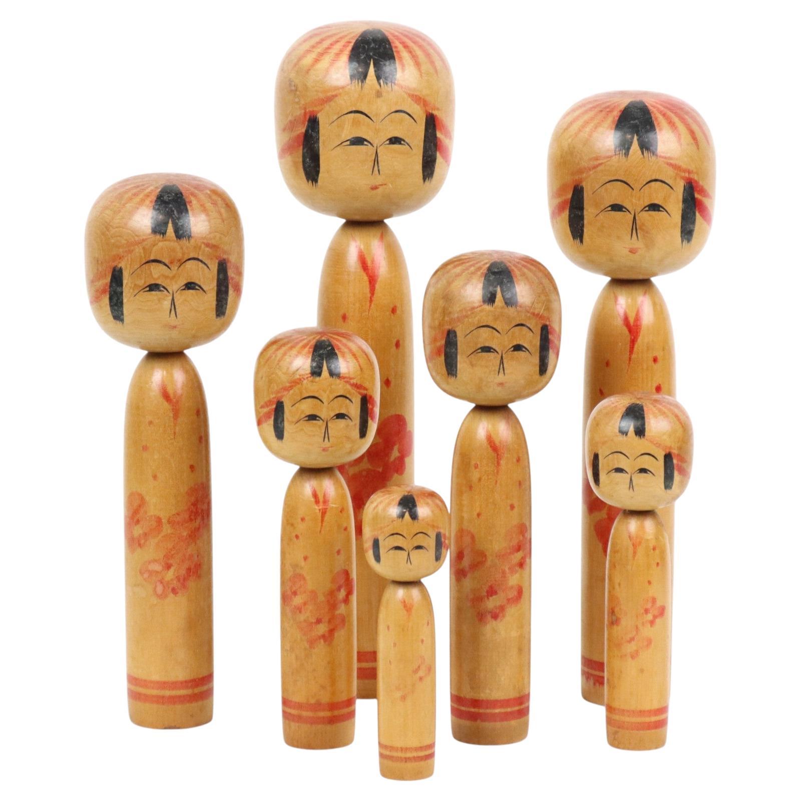 Lot of 7 Kokeshi Dolls Tomio Sato Hand-painted Wood Japan