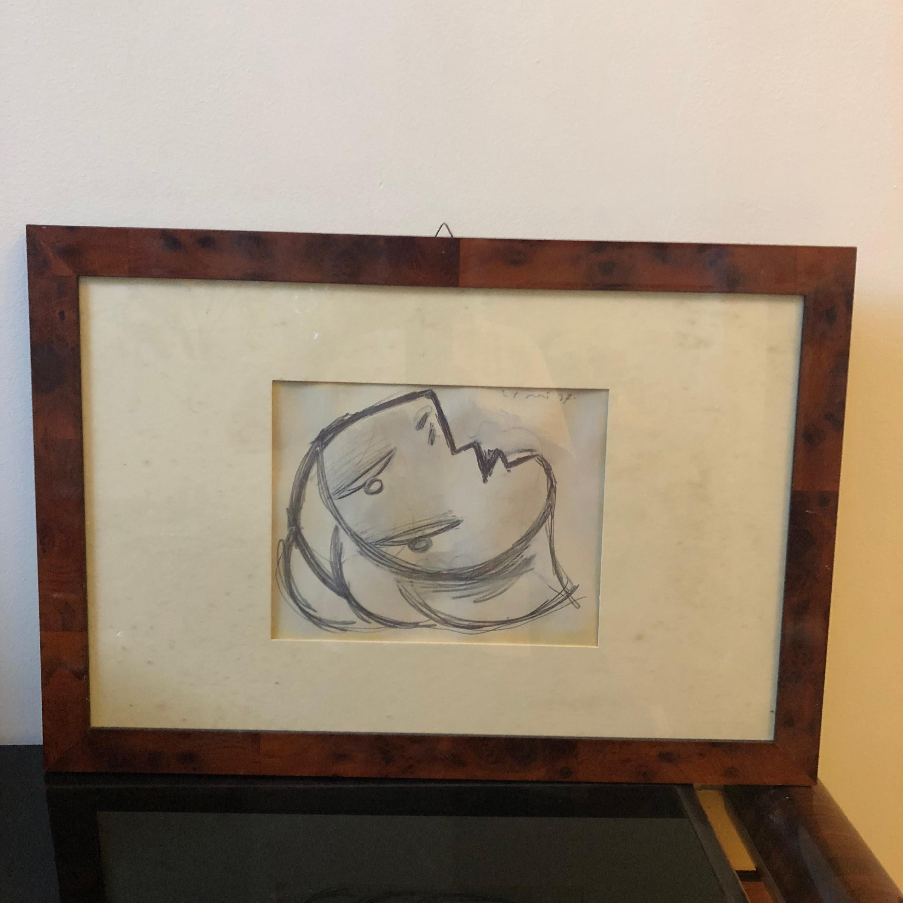 Five anastatic copies of Picasso's Guernica sketches in a walnut-root frame, good conditions overall, realized in the 1970s.