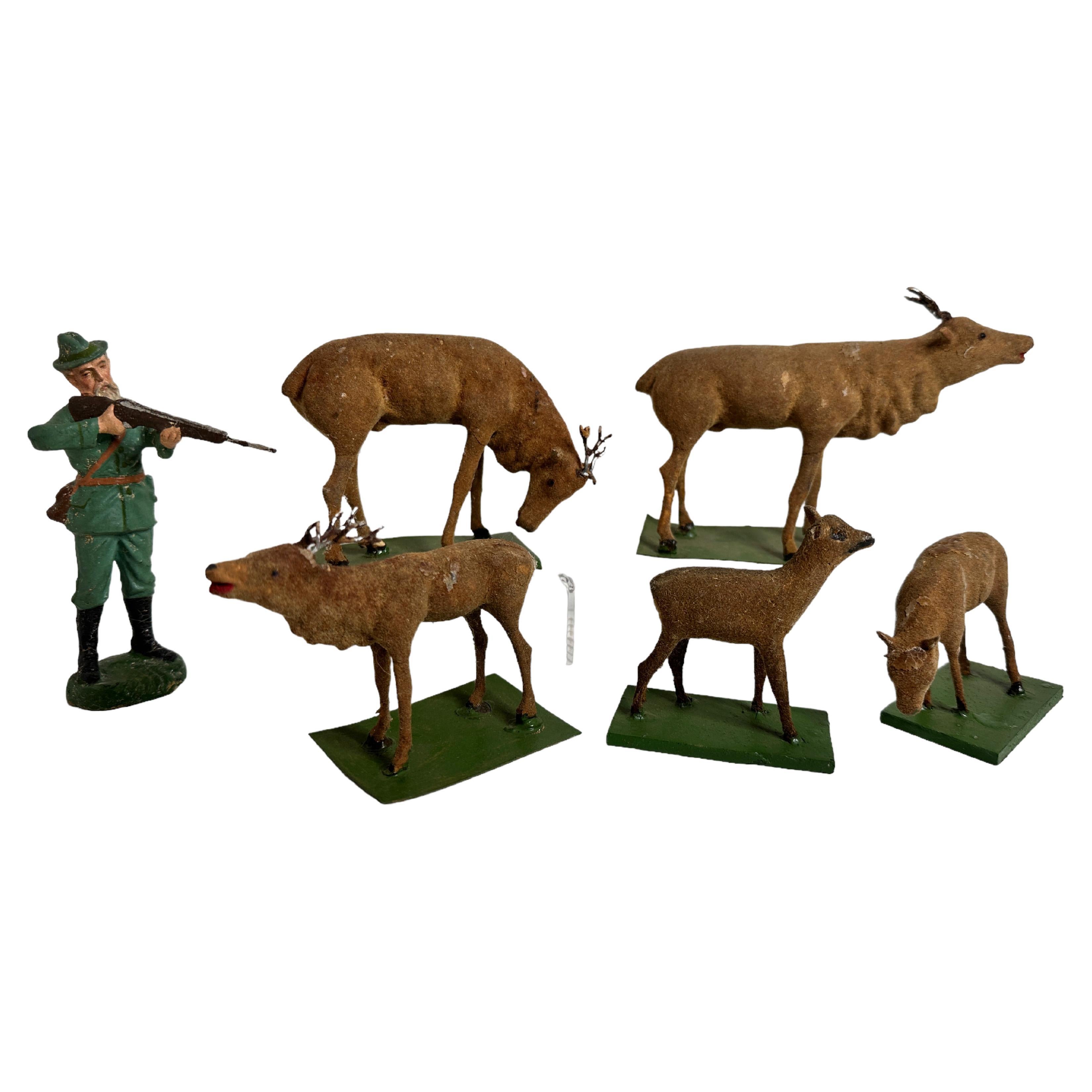 Lot de cinq jouets de cerfs et de chasseurs ancien Erzgebirge de Noël des années 1880