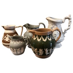 Lot of Five Mid-19th CenturyRelief Pitchers or Jugs by Cobridge & Copelands
