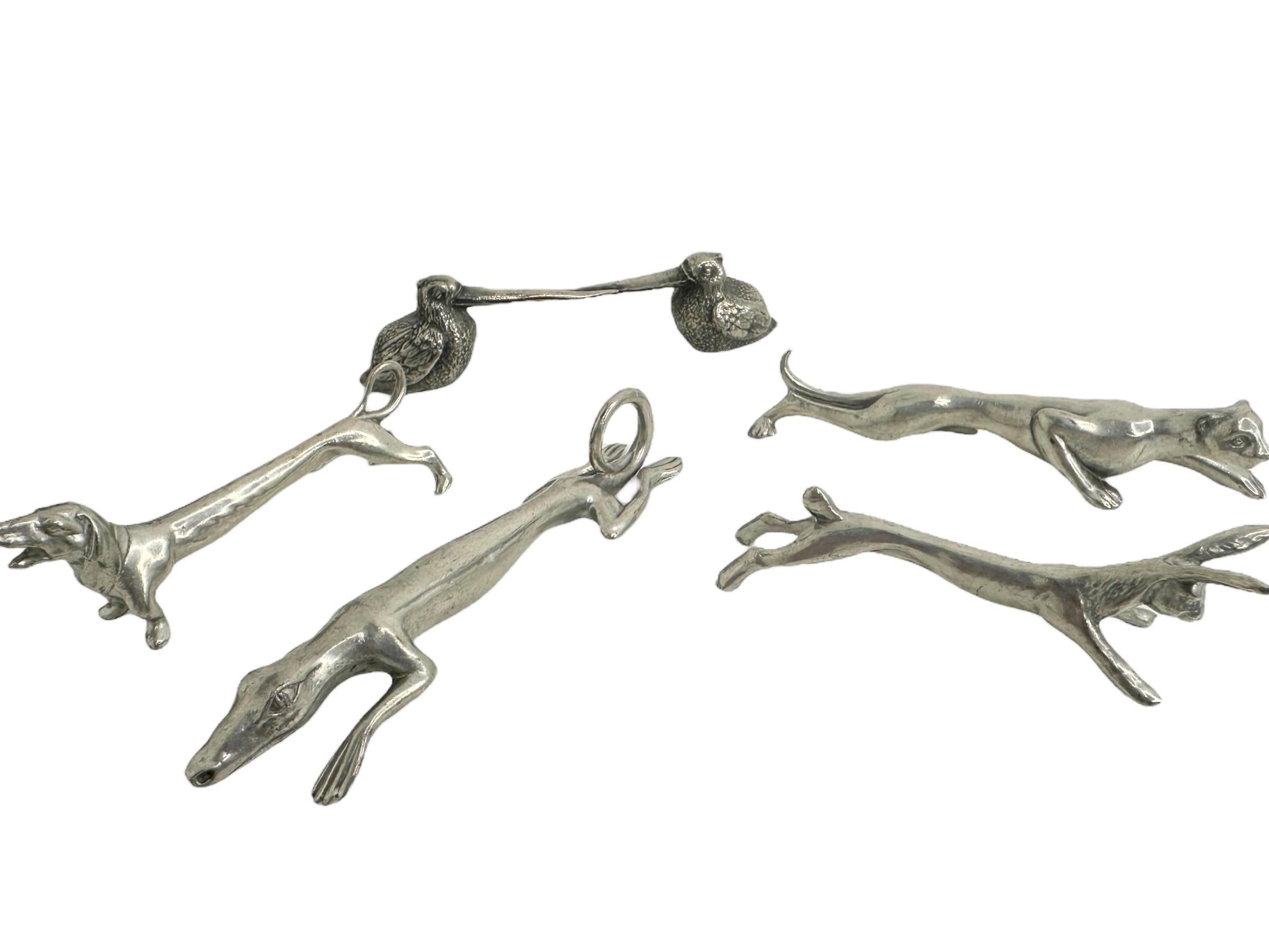 Lote de cinco apoyacuchillos de metal plateado con motivos de animales Austria Siglo XX Art Nouveau en venta
