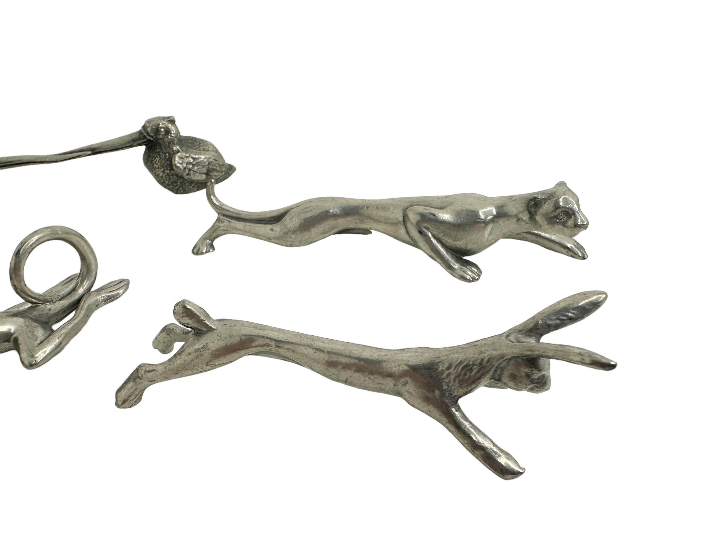 Lote de cinco apoyacuchillos de metal plateado con motivos de animales Austria Siglo XX Plateado en venta