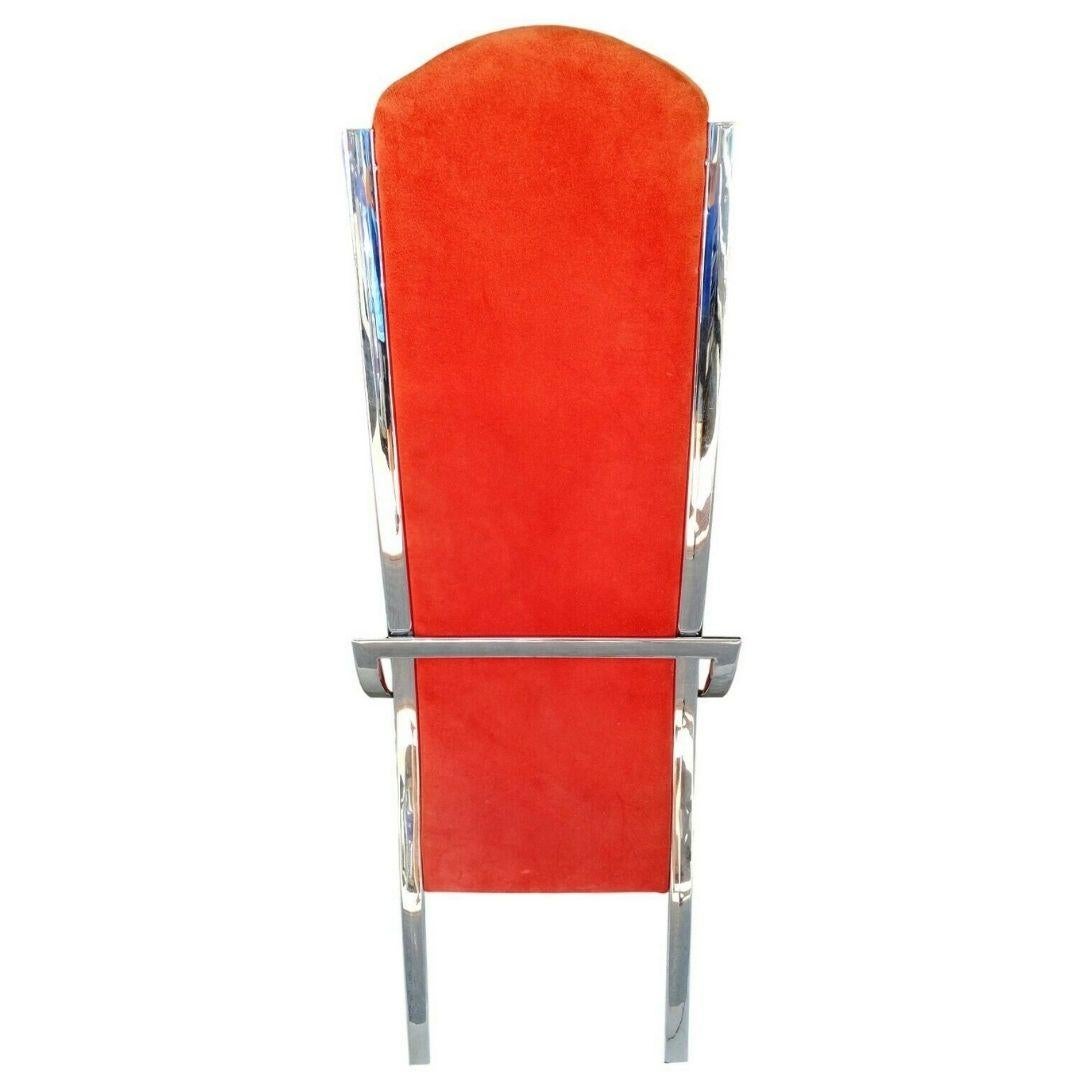 Lot of four splendid original chairs from the 70s made in the style of romeo rega, with chromed steel structure, seat and high back upholstered in orange / rust alcantara

In excellent condition, the chrome is in perfect condition as is the