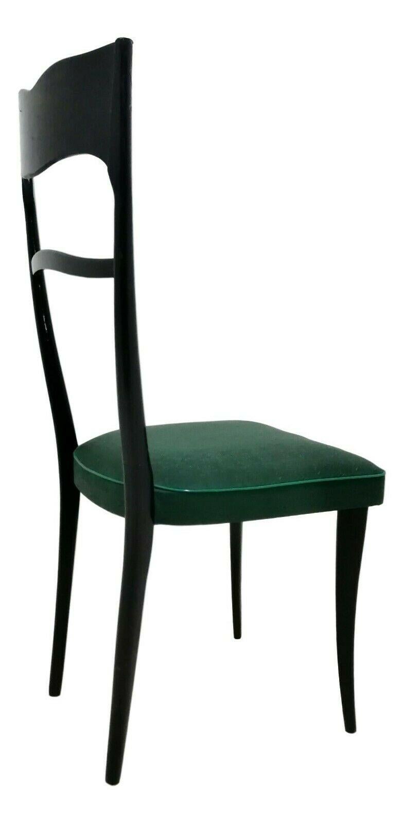 Satz von vier italienischen Designstühlen aus den 1960er Jahren, elegante Ausführung, aus Holz, wahrscheinlich Nussbaum, mit flaschengrüner Skay-Polsterung

sie messen 100 cm in der Höhe, 45 cm in der Breite, 50 cm in der Tiefe und etwa 45 cm in