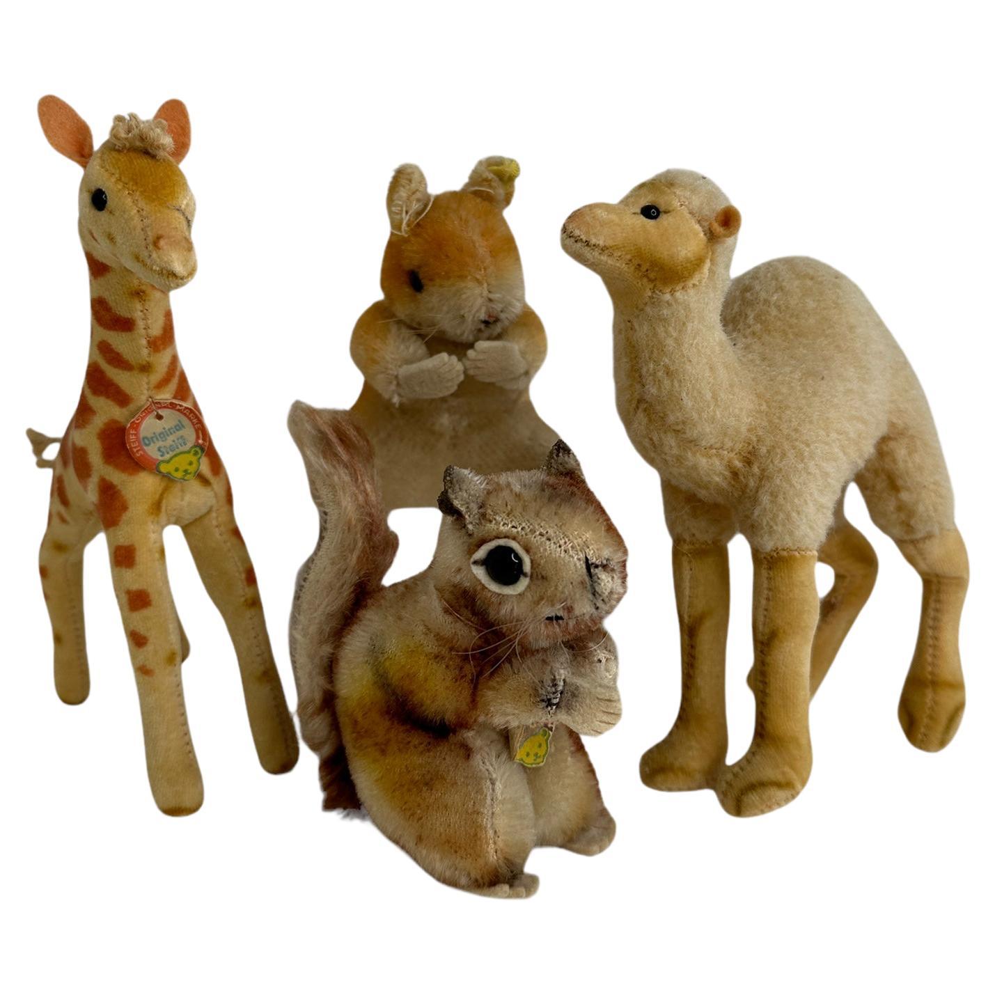 Lot de quatre animaux Steiff vintage, écureuil, camel, girafe et girafe, années 1960