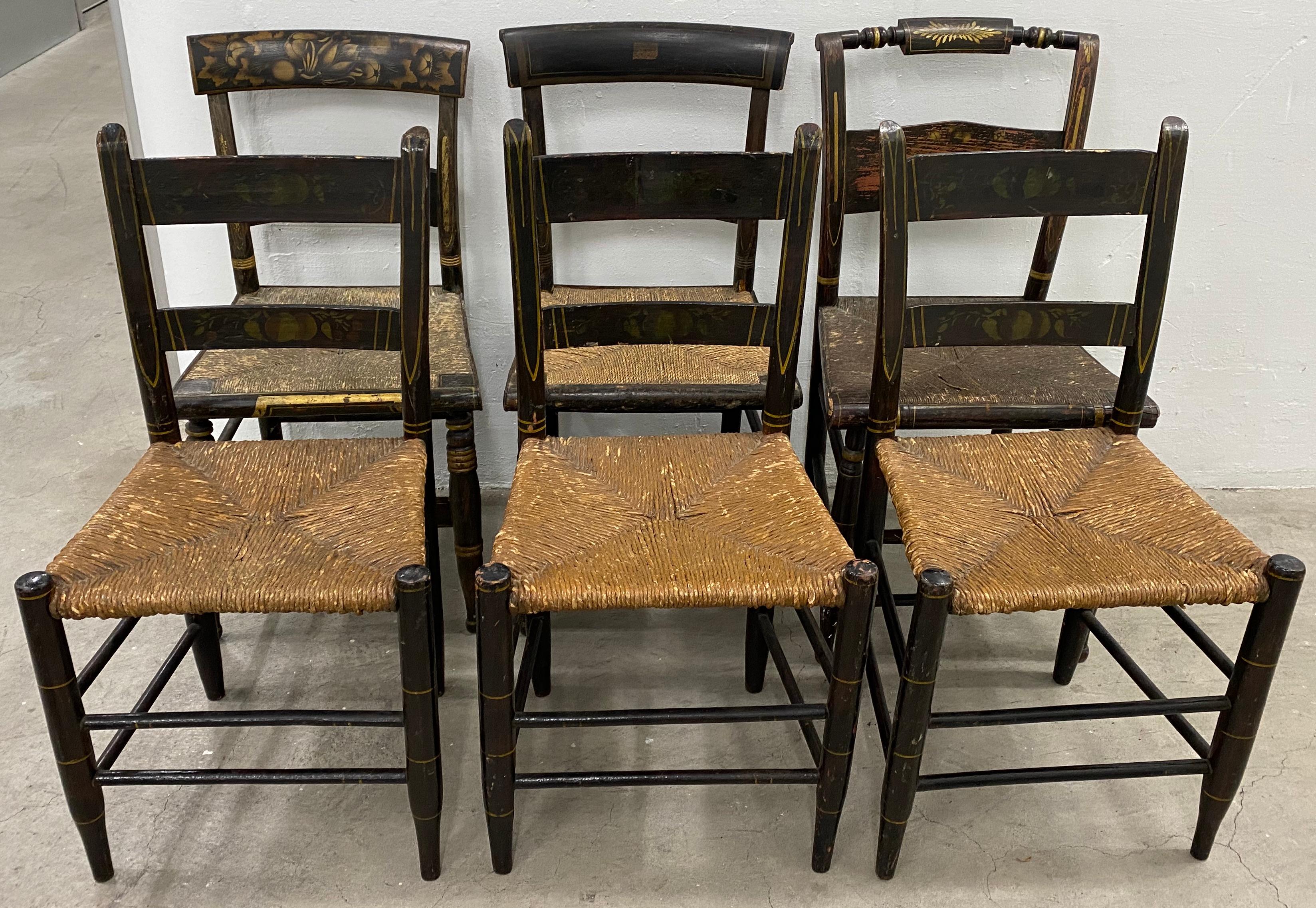 Lot of six mid-19th century Mis-Matched American Hitchcock side chairs

Each chair is handmade and hand stenciled / painted.

Approximate dimensions: 17