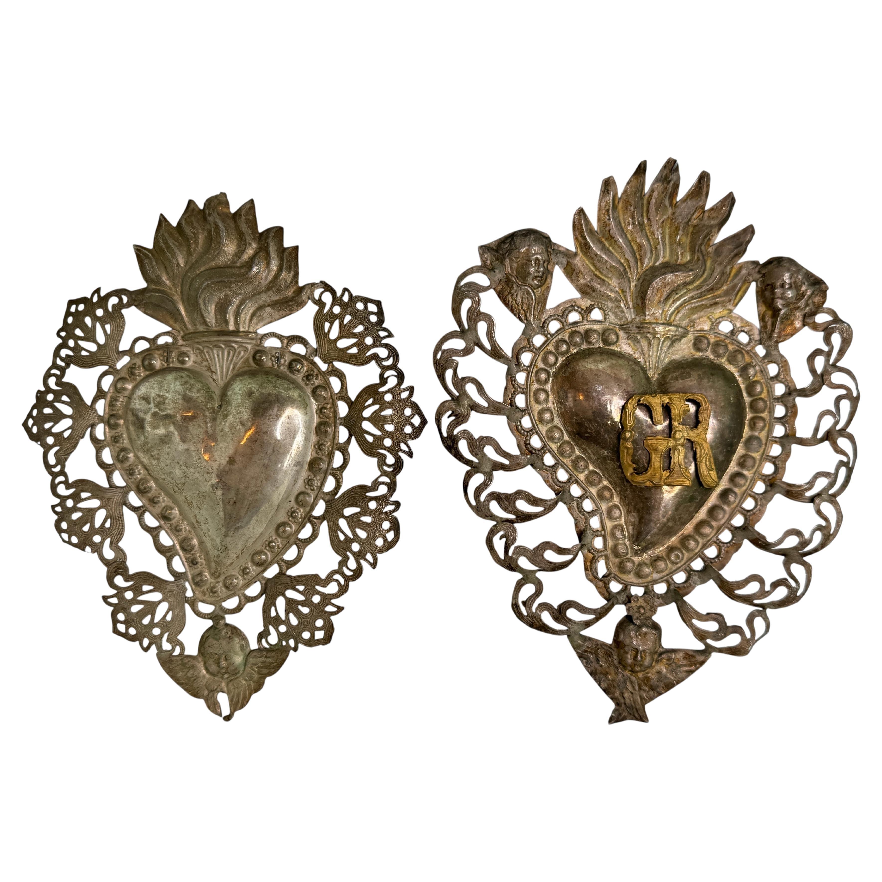 Lote de dos Ex Voto de Plata del Sagrado Corazón con Ángel Querubín, Antiguo Europeo 1900s en venta