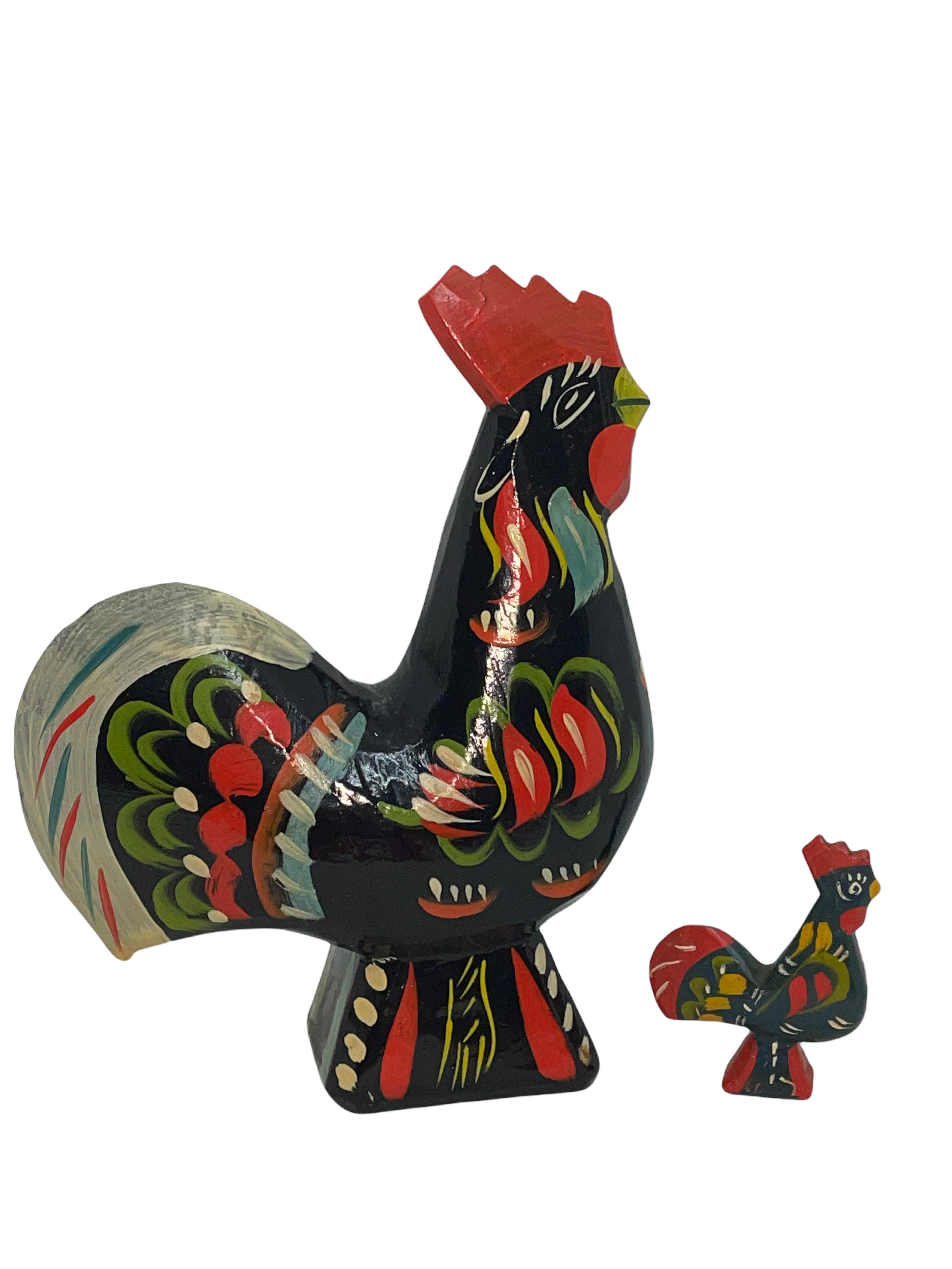 This offer is for a collection of two Swedish Dala rooster Chicken by Nils Olsson. Each is hand carved painted wood. Nice display item for every room. Measures: The large one is approx. 6 3/4