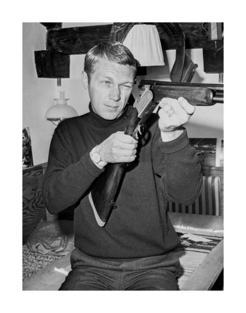Lothar Winkler Black and White Photograph - Steve McQueen Loading Rifle