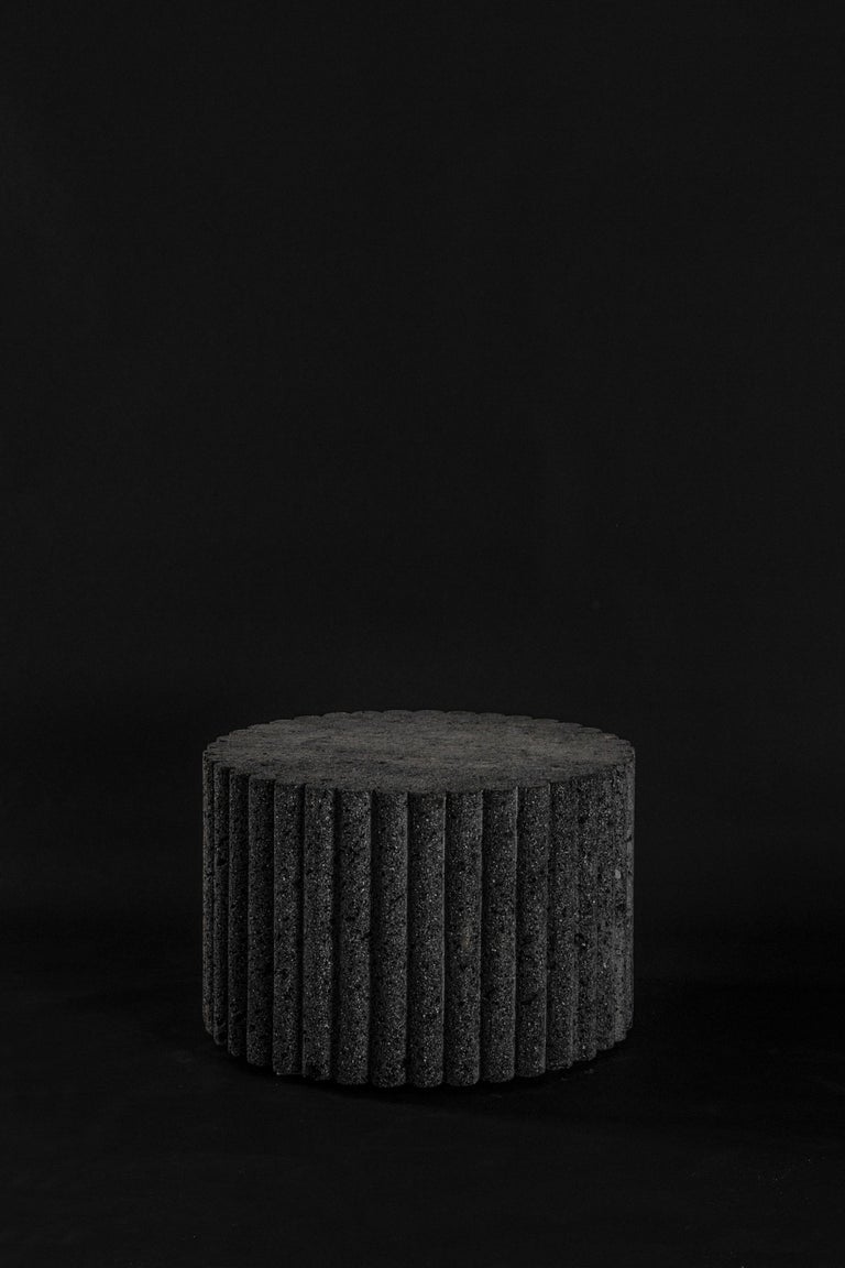 LOTO ROCA coffee table is exploration personified. This volcanic rock monolith has been carved mastering a meditative process with chisel and hammer. A coffee table recalling the esthetic character of the LOTO ROCA family: a meeting point in social