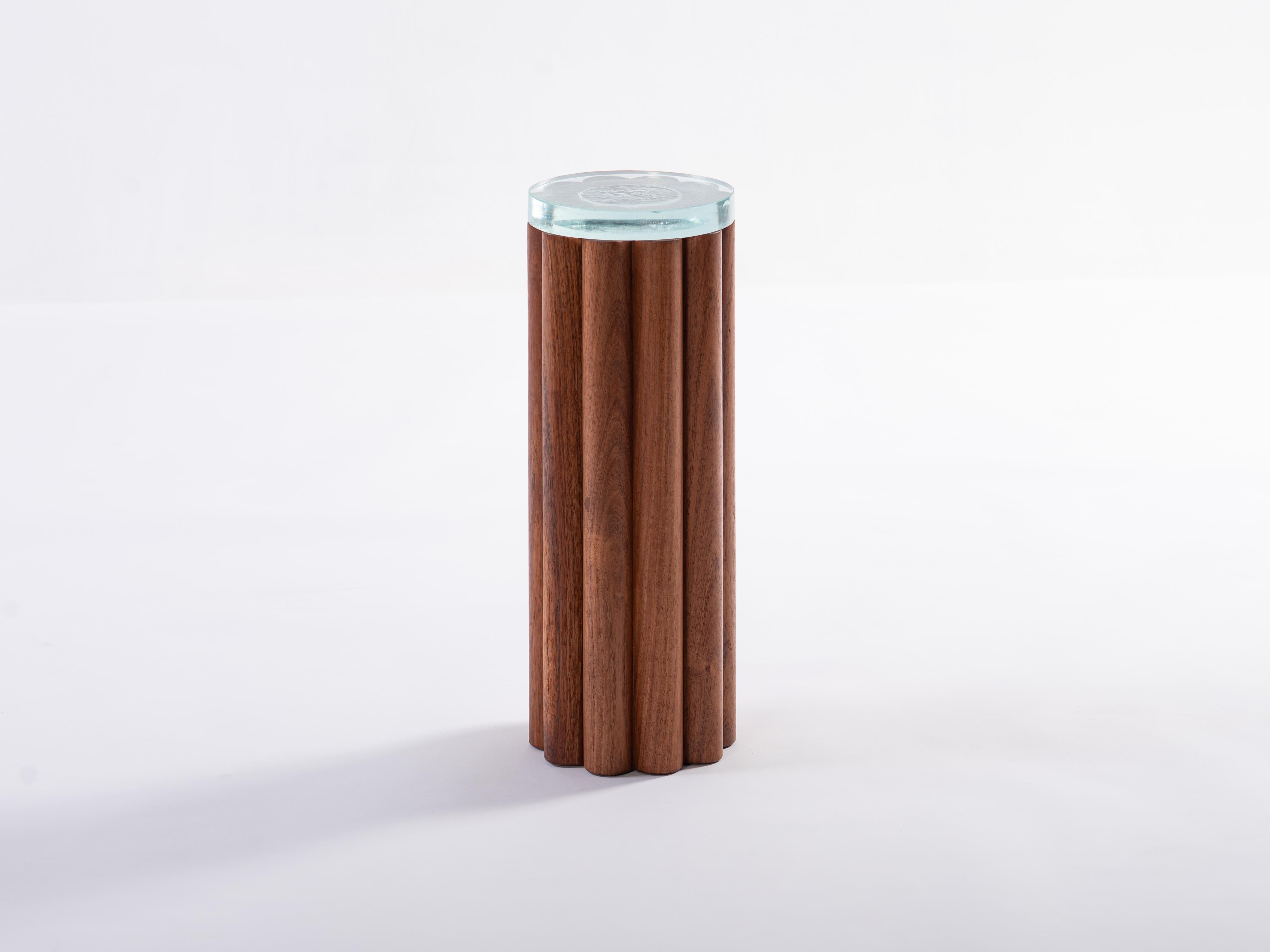 What started with an exploration using turned wooden rods and the right amount of curiosity-playing around with the possibilities of the cylindrical shapes and the use of positive/negative shapes-became the expressive essence of our Loto collection.