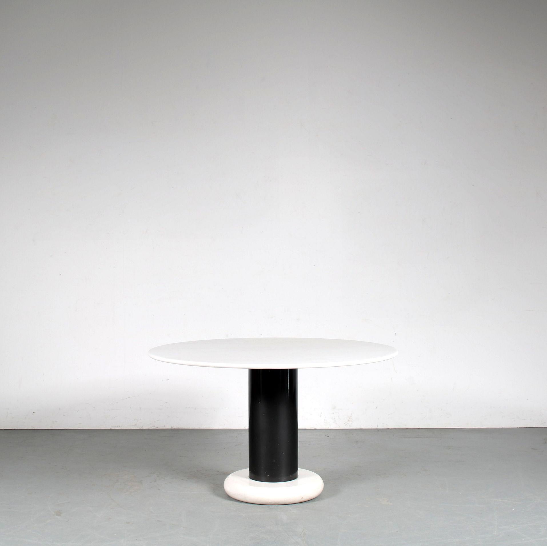A wonderful dining table, model “Lotorosso” designed by Ettore Sottsass, manufactured by Poltronova in Italy around 1960.

It has an eye-catching and highly recognizable design! The round foot and round top are both made of beautiful quality white