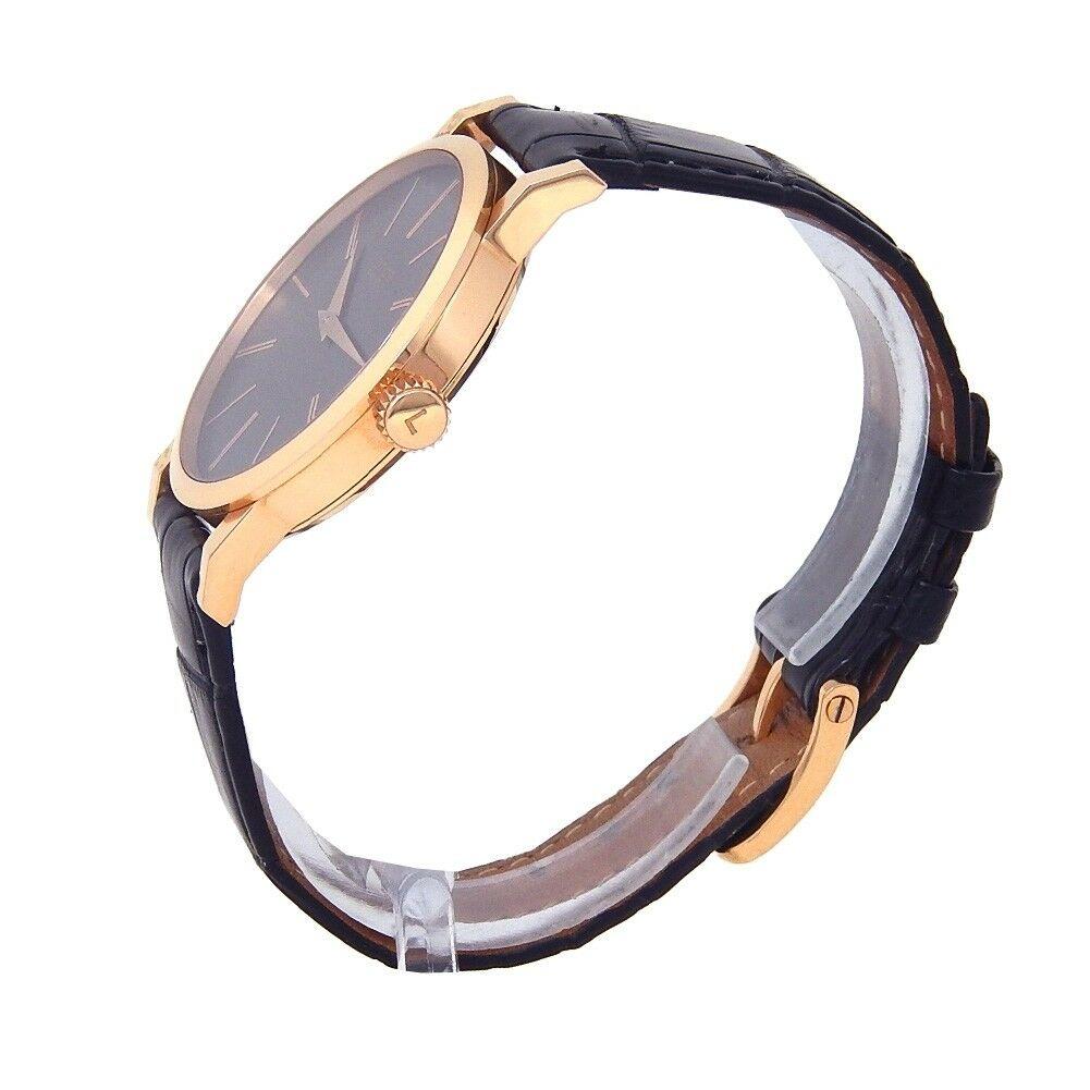 Gender:	Men's
Band Color: Black	
MPN: Does Not Apply
Case Size: Not Specified	
Features:	Non-Numeric Hour Marks, Sapphire Crystal, Skeleton Back, Swiss Made, Swiss Movement
Lug Width: 20mm	
Movement: Mechanical (Hand-winding)
Style: Casual	
Water