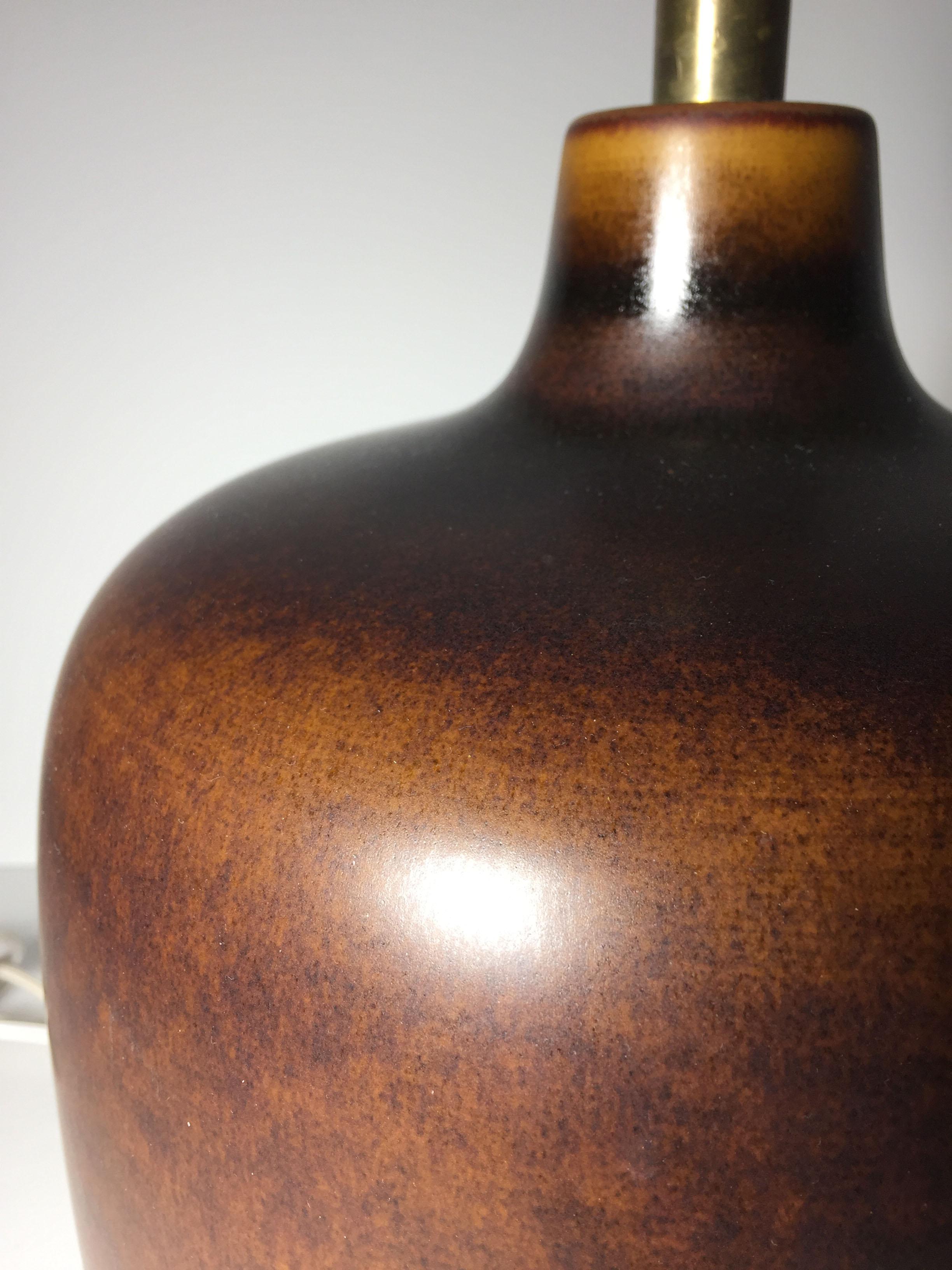 Gorgeous Bostlund ceramic lamp with rich warm brownish glaze. Style of Palshus & Rorstrand Ceramics.

Lotte and Gunnar Bostlund were Danish trained and created their lighting in Canada beginning in the early 1950s.

 