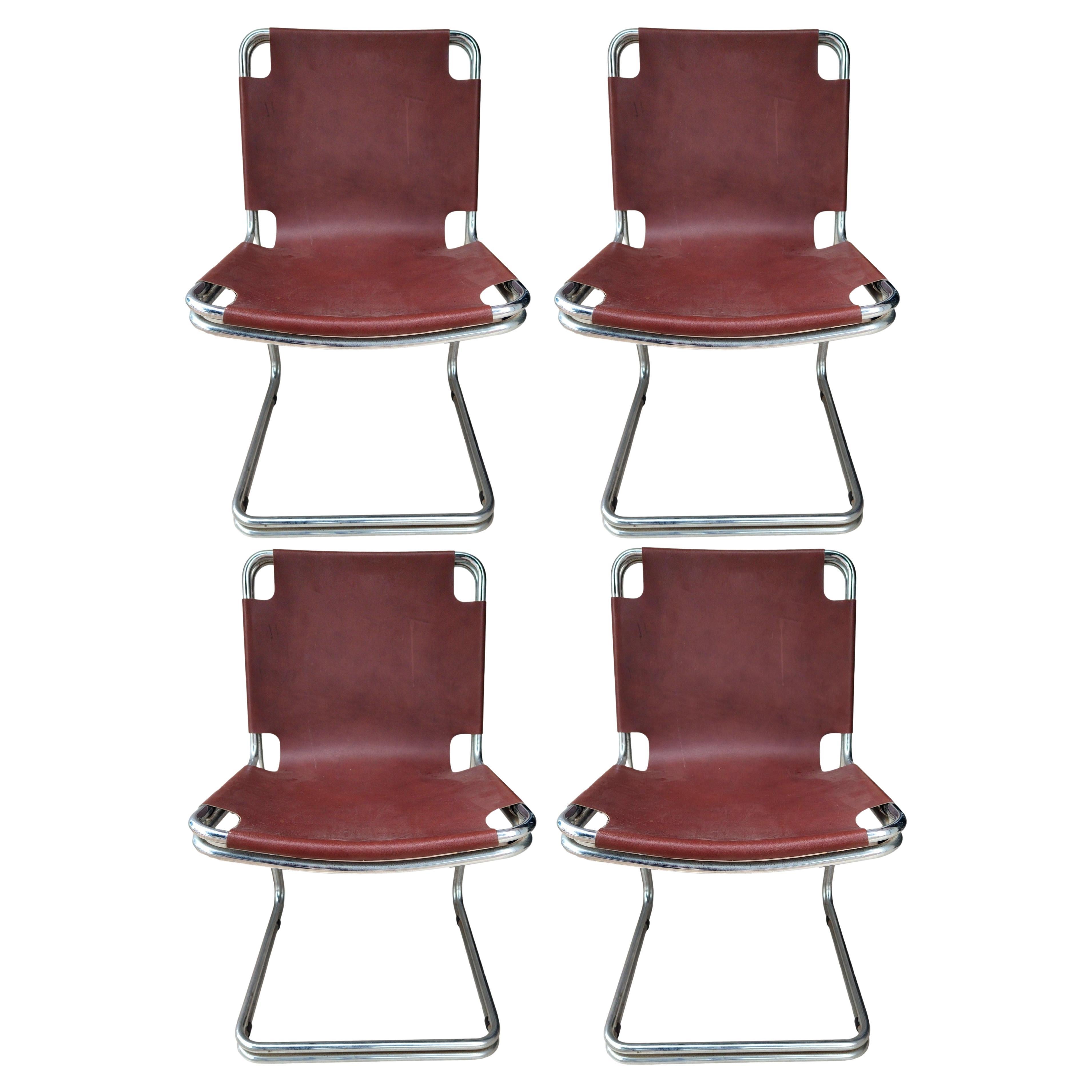 lot de quatre chaises en métal et cuir dans le style de Pascal Mourgue 1970