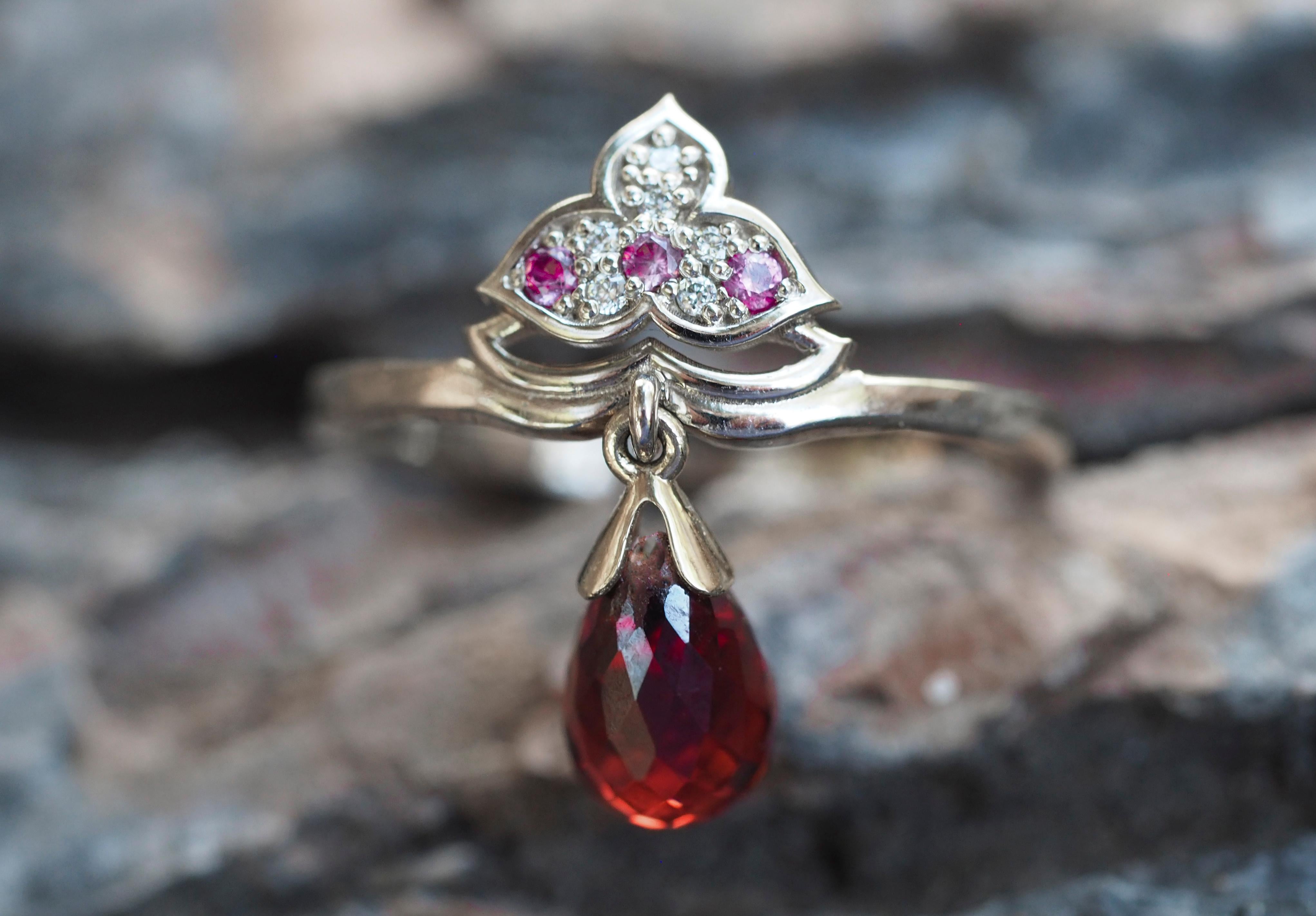 Lotus 14k gold ring with garnet. 
January birthstone ring. Gold Lotus Flower Ring. Garnet briolette gold ring. Teardrop garnet ring.

Metal: 14k gold
Weight 2.17 gr. depends from size.

Gemstones:
Garnet: briolette shape, red color, Si clarity, 1