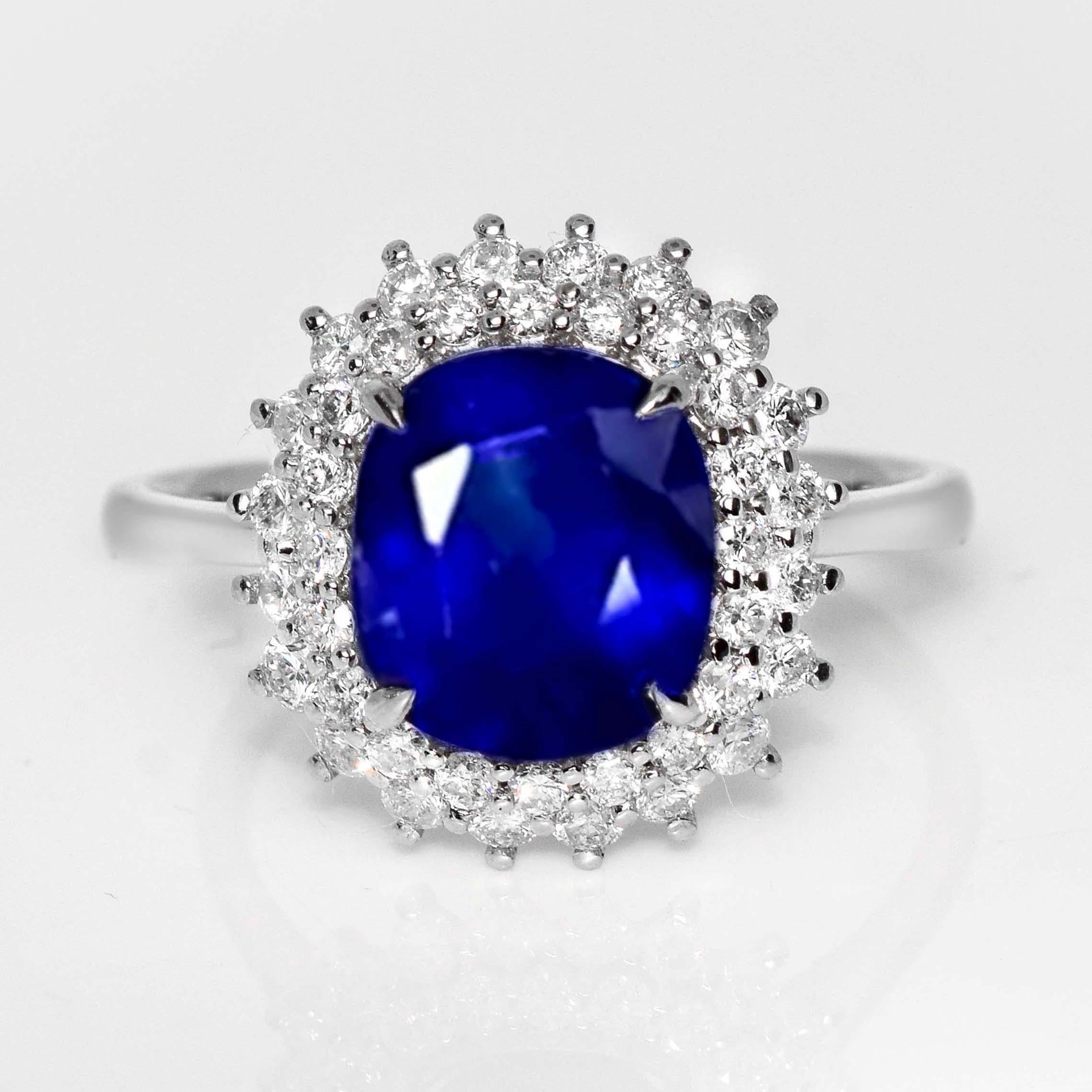 *Lotus 18K 5.09 ct Royal Blue Sapphire Art Deco Engagement Ring*
Lotus-certified natural royal blue sapphire as the center stone weighing 5.09 ct set on the 18 carat white gold halo design and pave' band with natural FG VS diamonds weighing 0.85 ct.