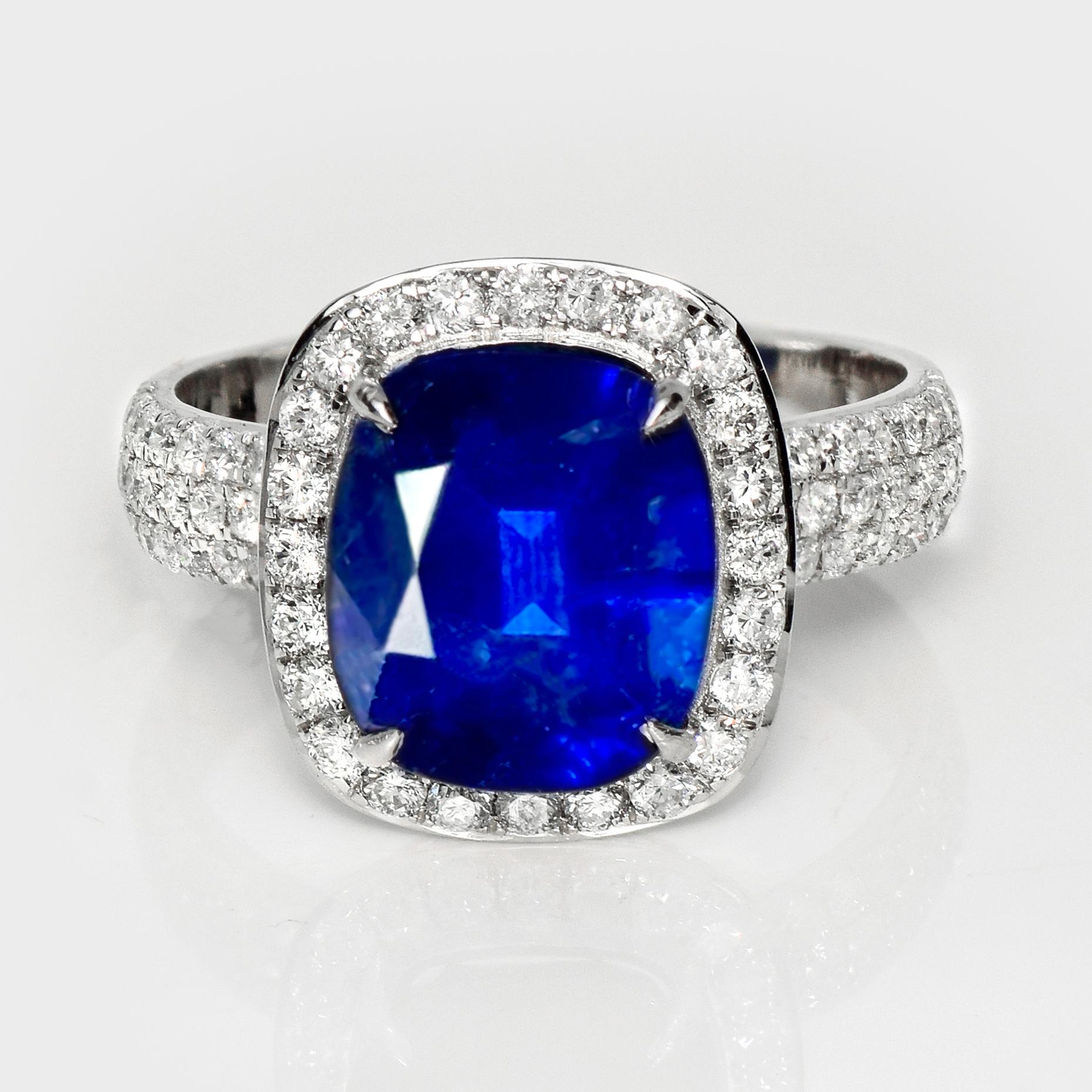 *Lotus 18K 5.57 ct Royal Blue Sapphire Art Deco Engagement Ring*
Lotus-certified natural royal blue sapphire as the center stone weighing 5.57 ct set on the 18 carat white gold halo design and pave' band with natural FG VS diamonds weighing 0.75 ct.