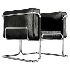Fauteuil Lotus - Canapé moderne en cuir noir, fabriqué à la main, avec pieds en acier